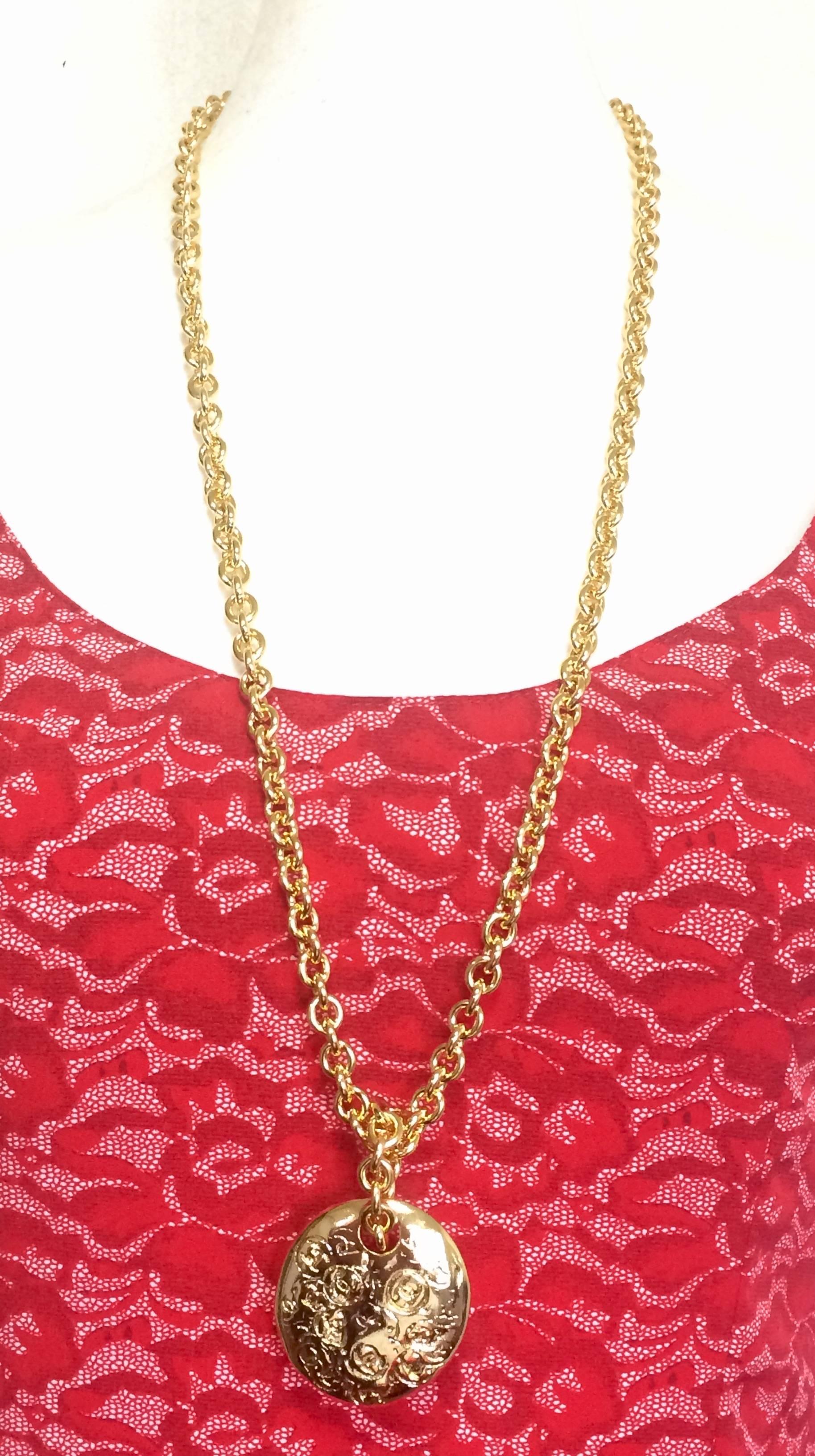 1990s. MINT. Vintage CHANEL golden long chain necklace with round coin, medal shape pendant top with randomly embossed cc. Rare Chanel jewelry.

MINT/Excellent condition!!
Great gift idea. Free gift wrapping.  

Introducing another hard-to-find long