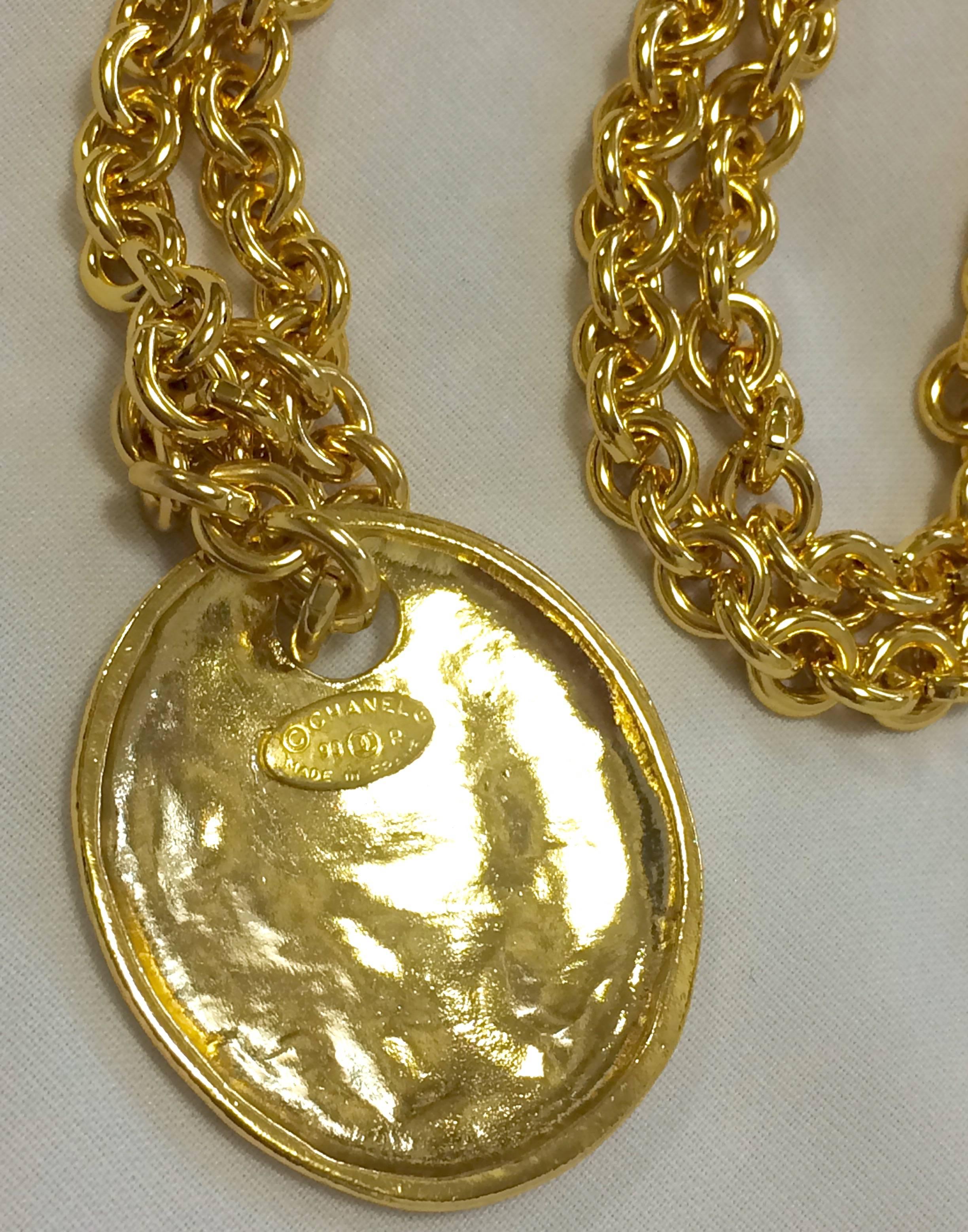 MINT. Vintage CHANEL golden long chain necklace with round coin, medal shape top 1