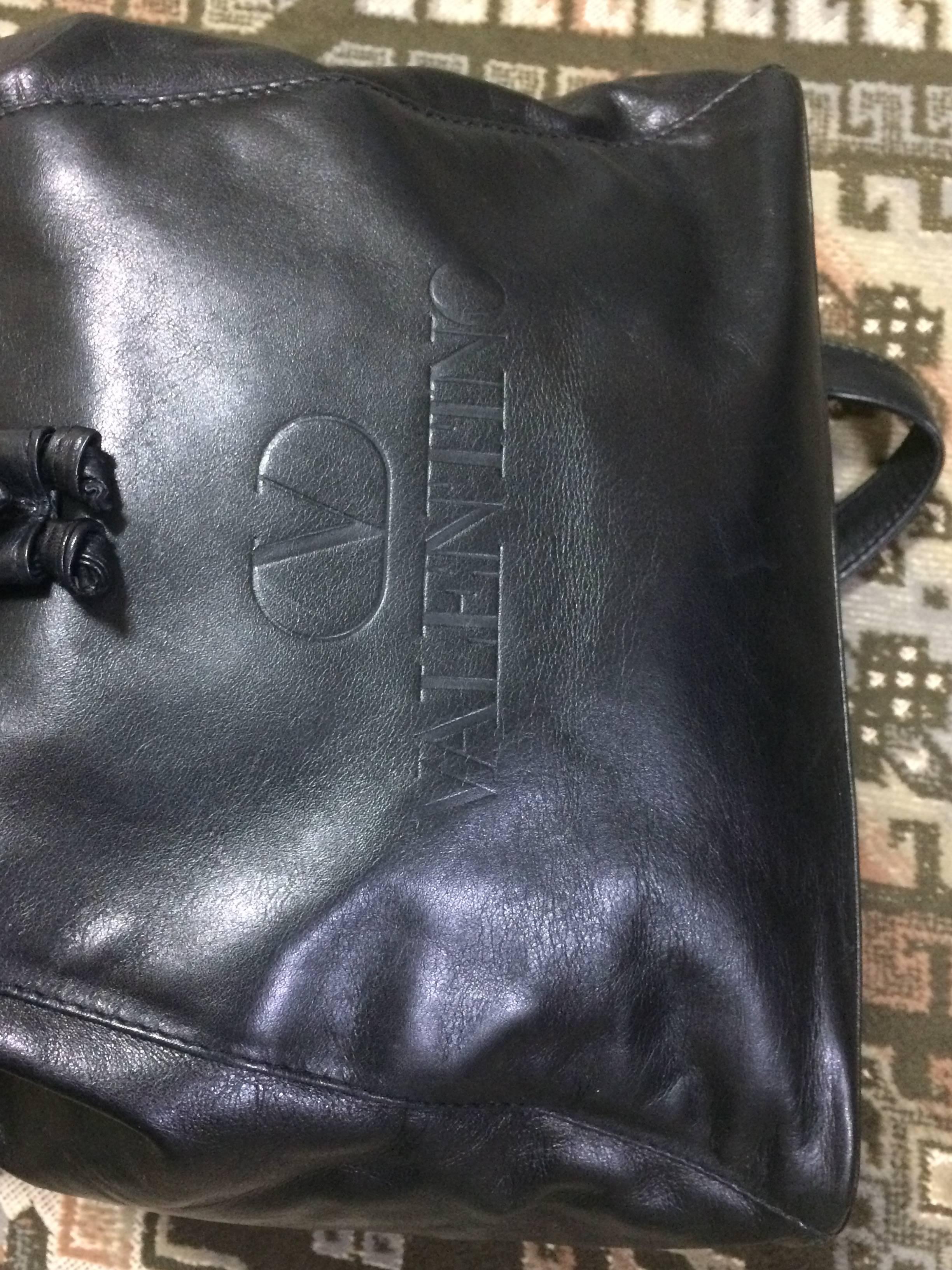 Black Vintage Valentino black nappa leather backpack with embossed logo. Classic bag.
