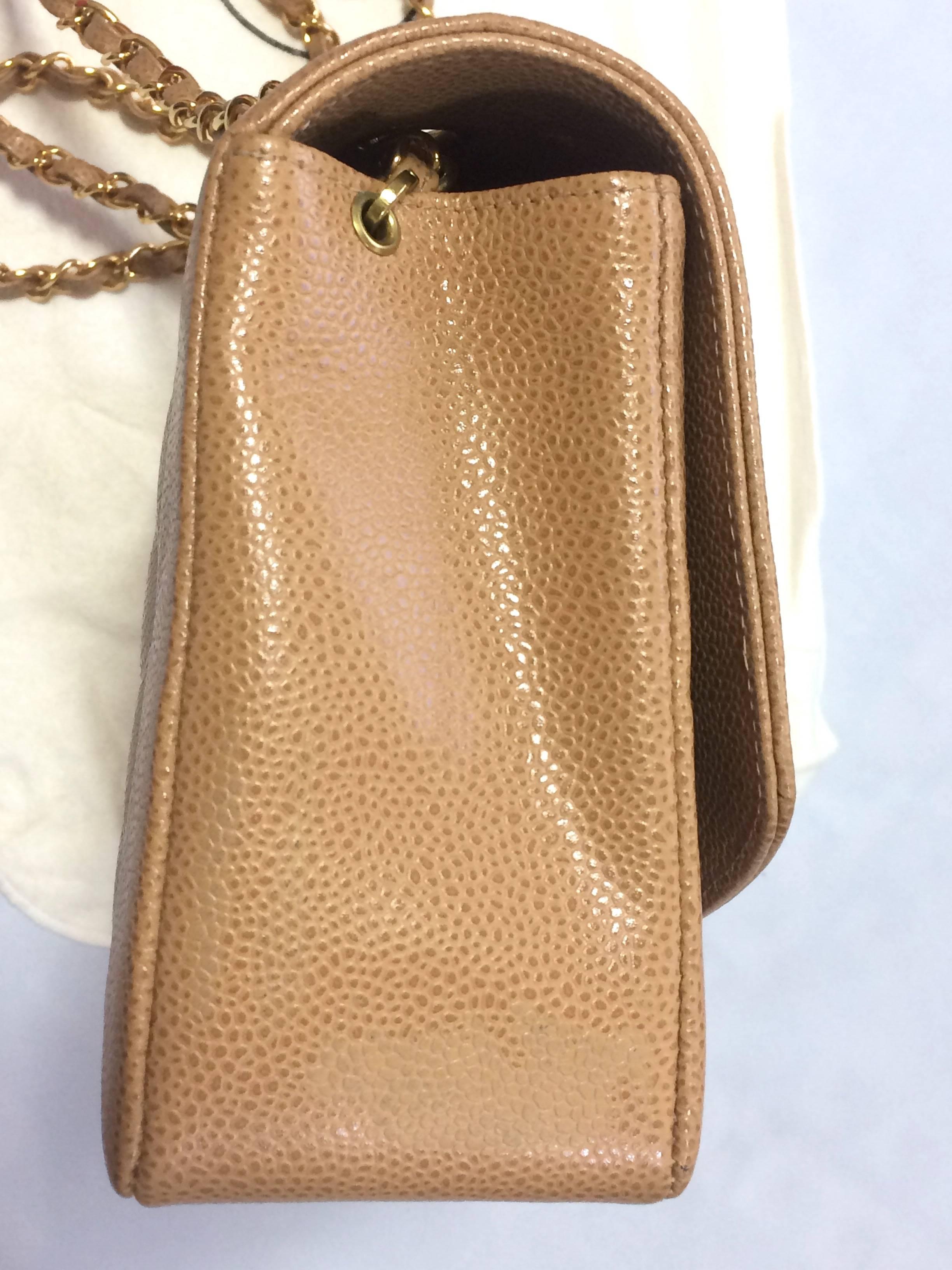 Women's or Men's MINT. Vintage Chanel brown beige caviar leather 2.55 flap shoulder bag with cc. For Sale