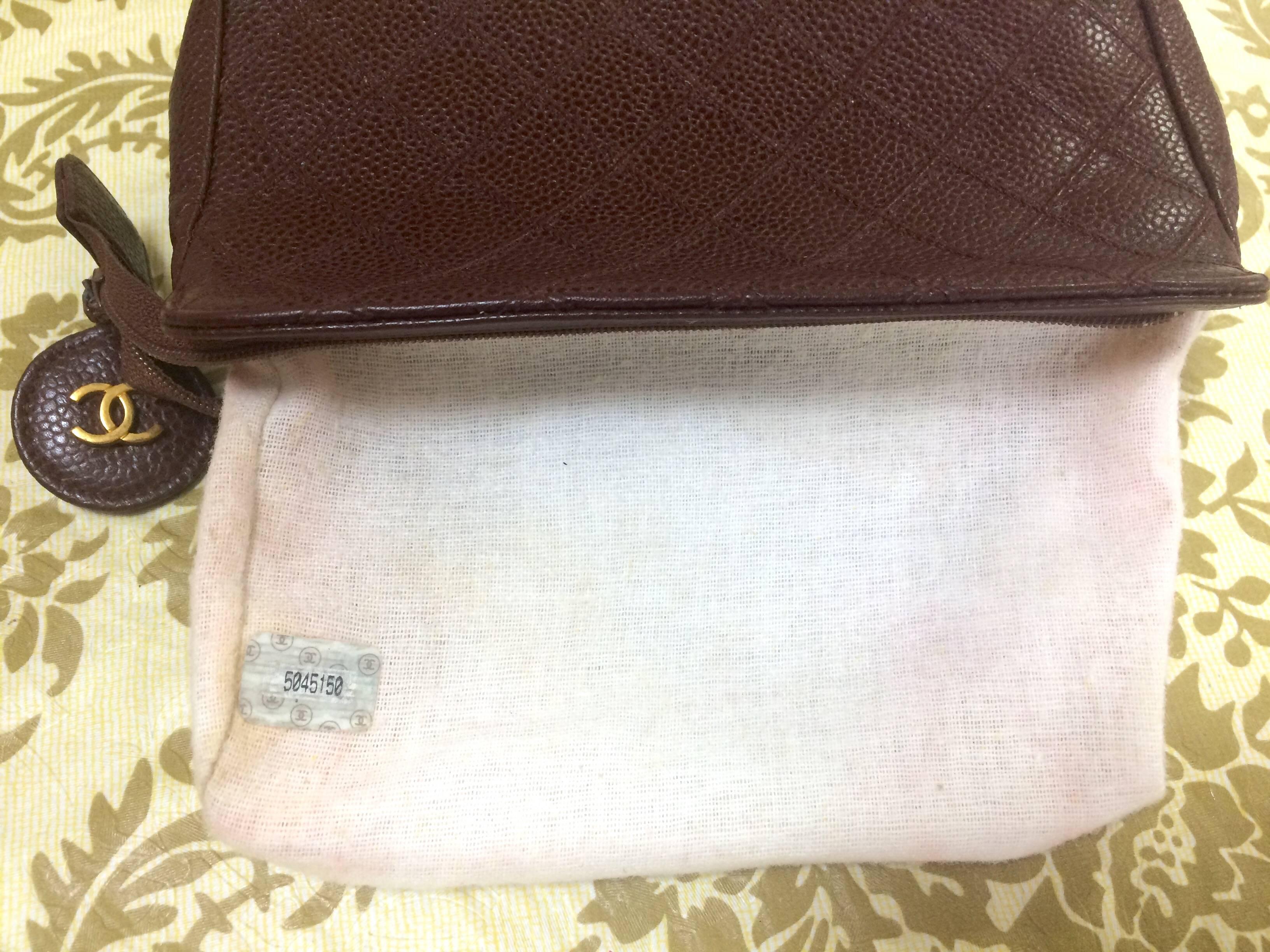 Women's or Men's Vintage CHANEL wine brown caviar leather cosmetic, toiletries, makeup pouch. For Sale