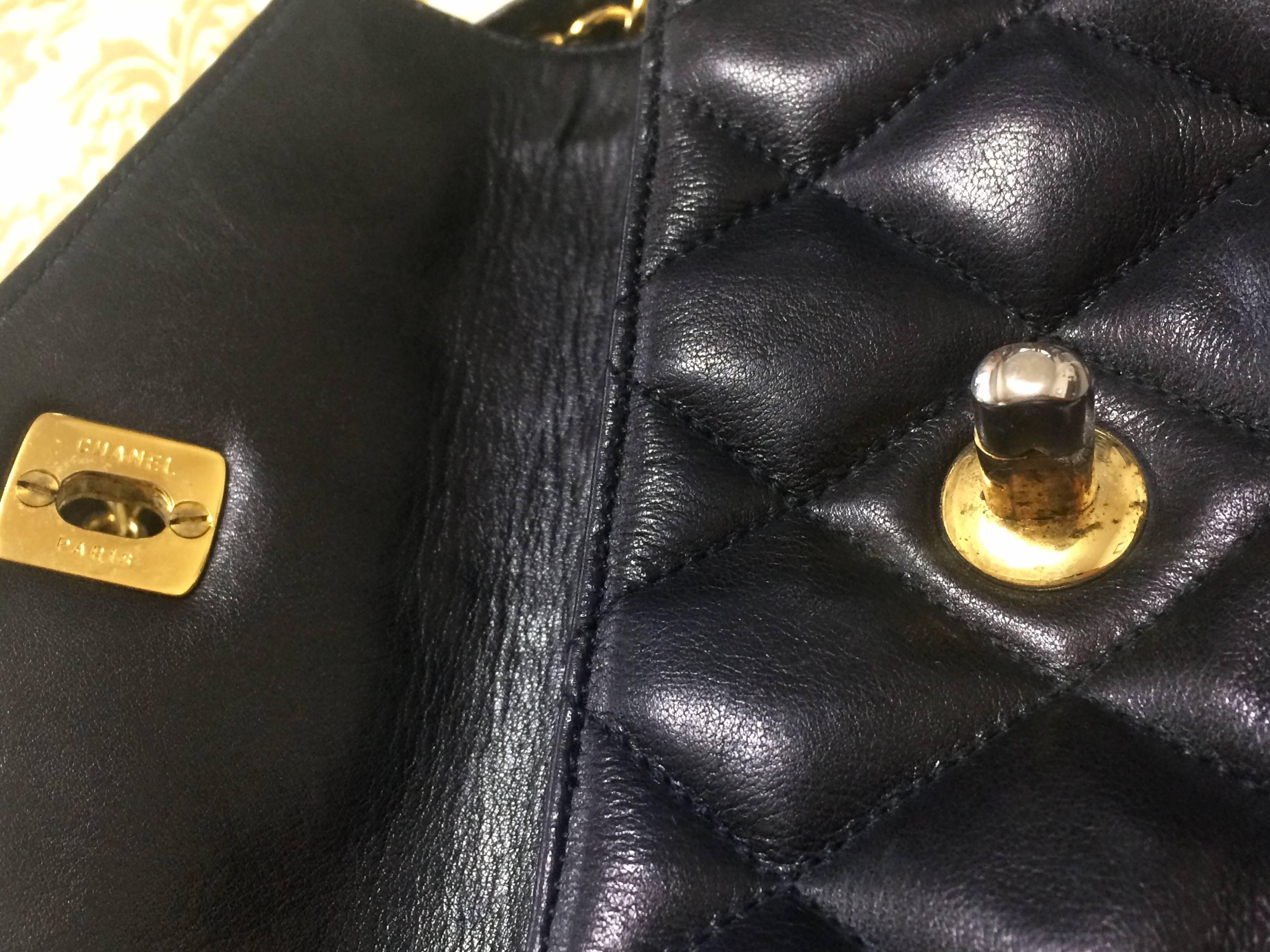 Vintage CHANEL black leather waist bag, fanny pack with golden chain belt & CC. 2