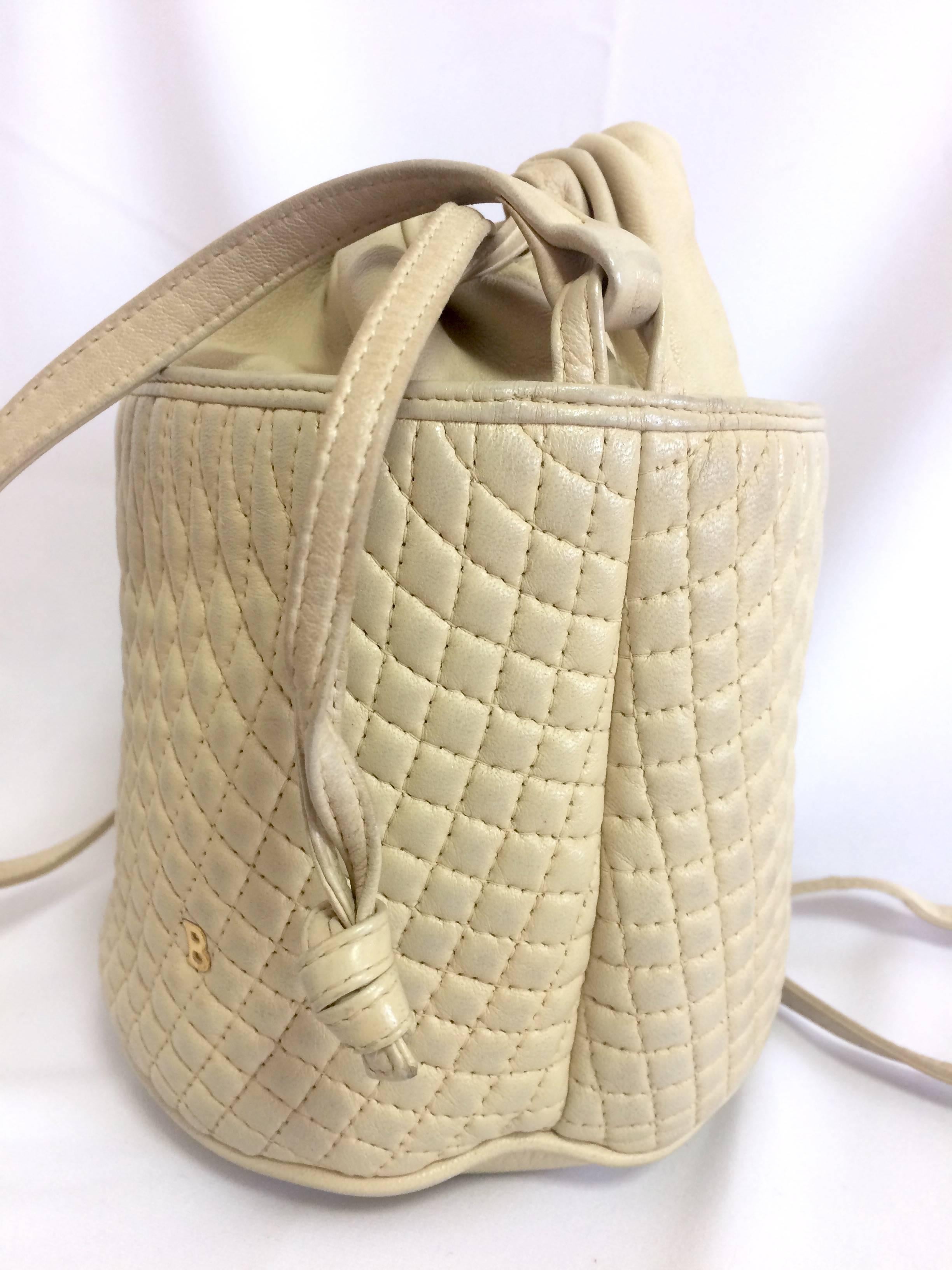 White Vintage BALLY ivory white quilted lambskin mini hobo, bucket shoulder bag. For Sale
