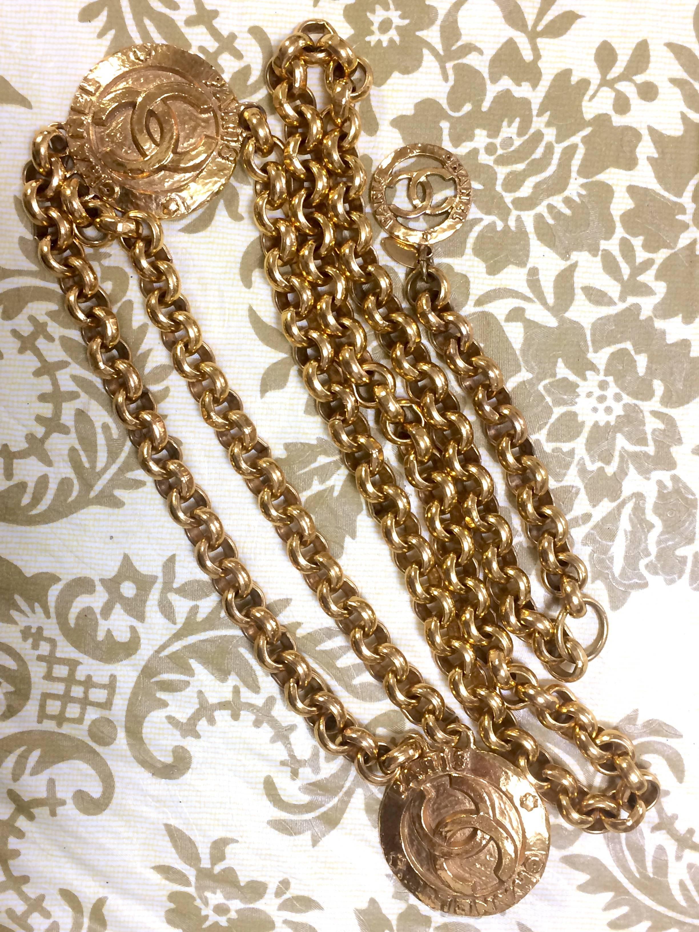 Brown Vintage CHANEL golden nice and heavy chain belt with two large CC round charms.
