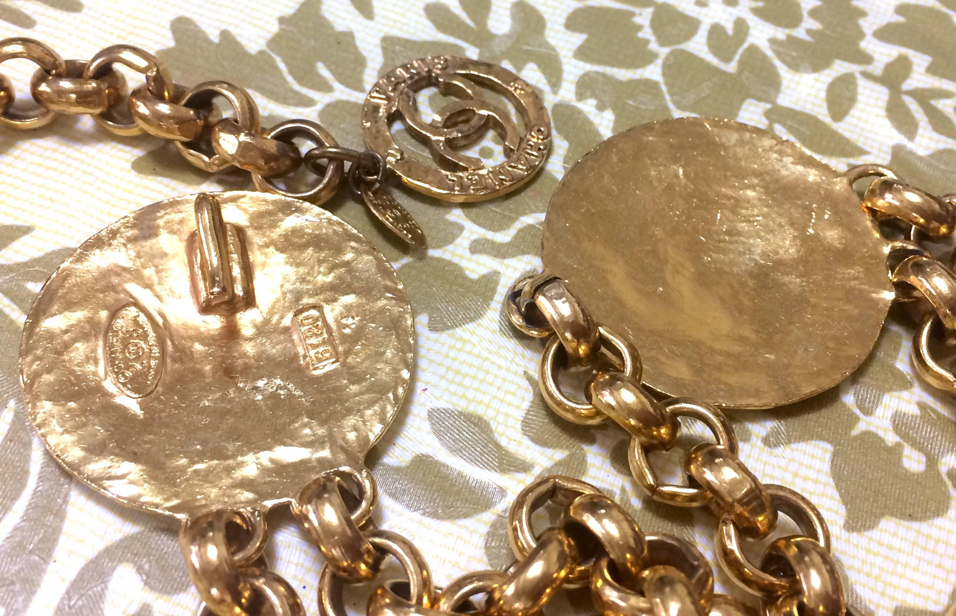 Vintage CHANEL golden nice and heavy chain belt with two large CC round charms. 2