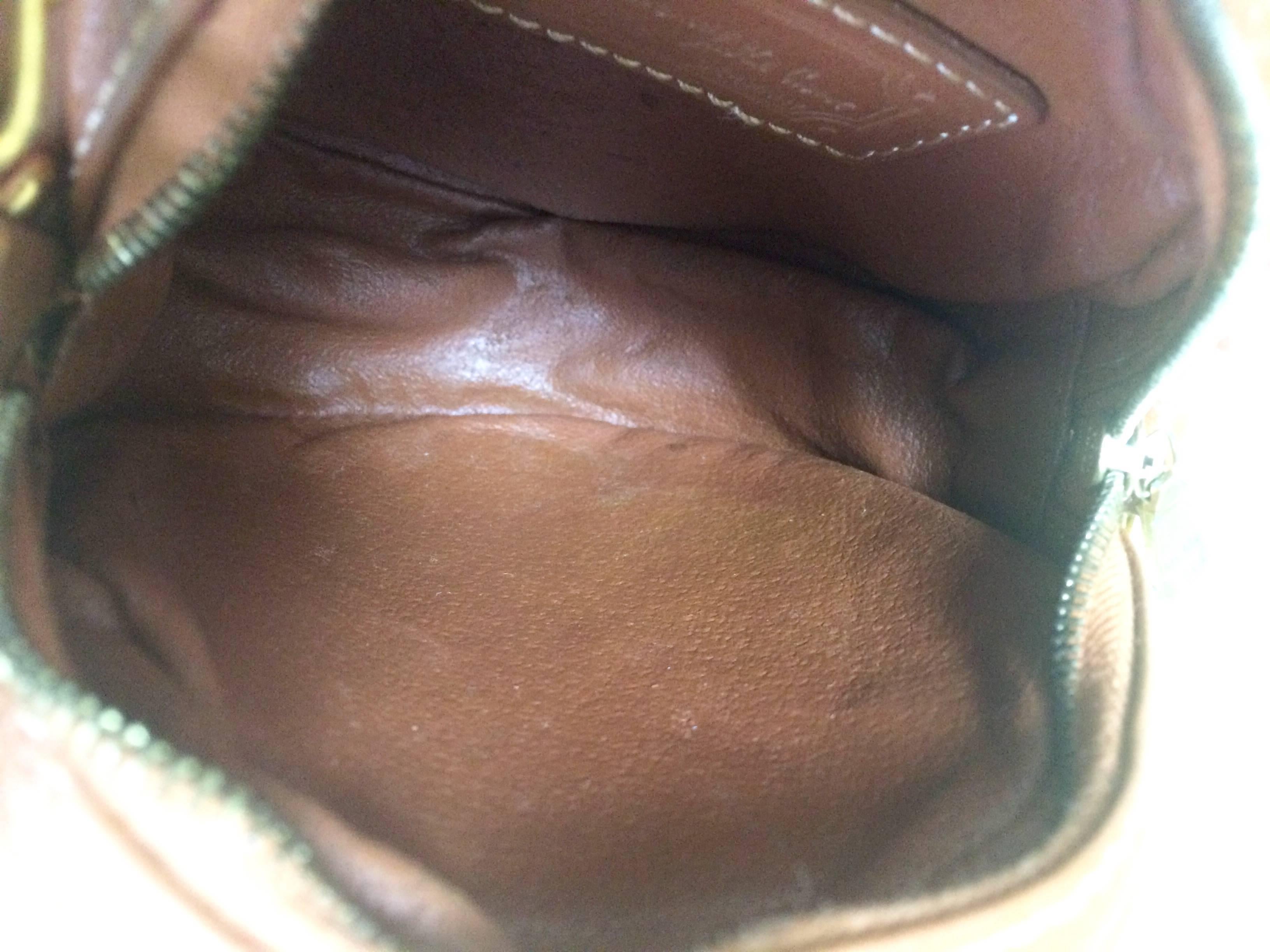 Vintage MCM brown leather round  mini Suzy Wong shoulder bag with fringes. For Sale 2