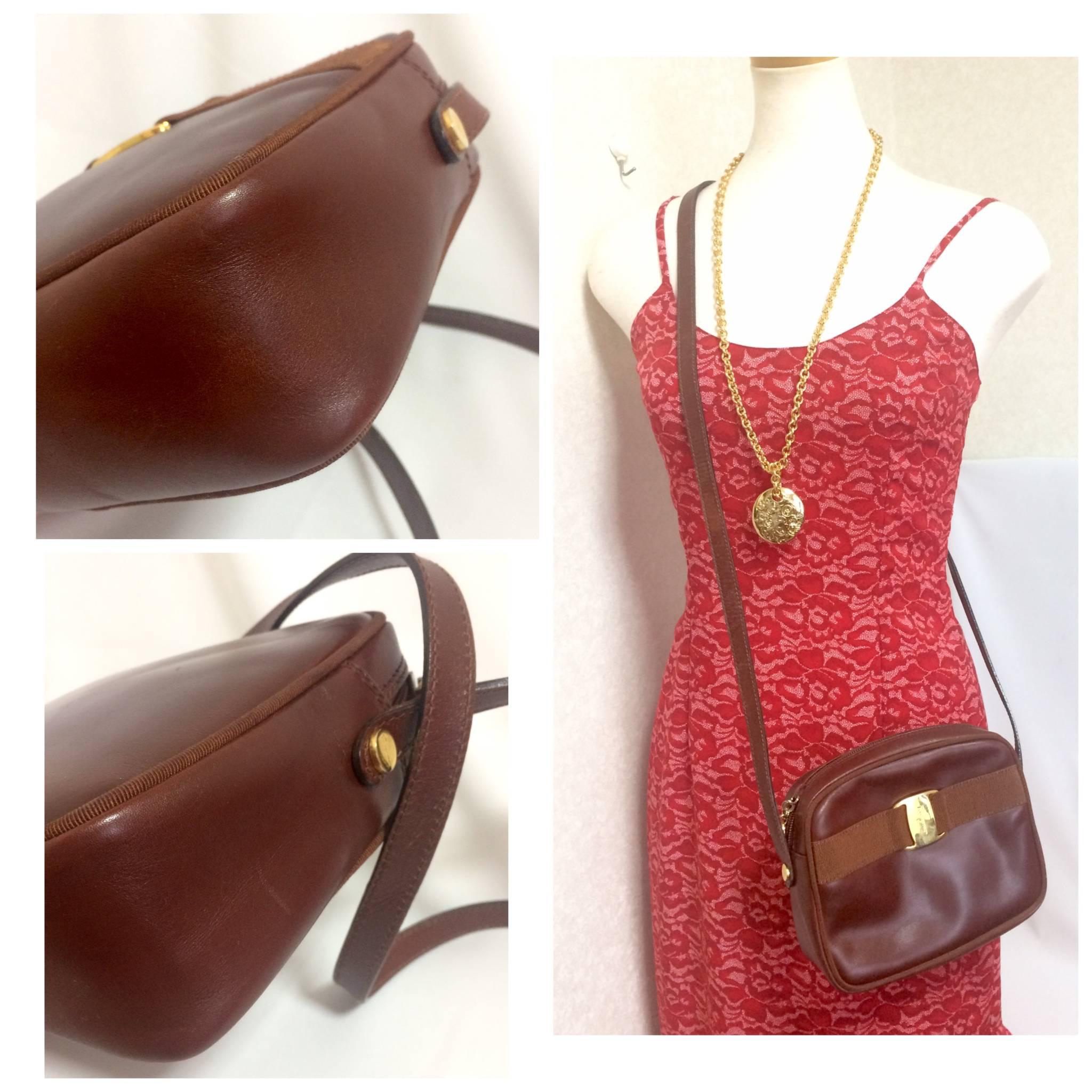 Vintage Salvatore Ferragamo vara collection brown leather purse with logo motif. 5
