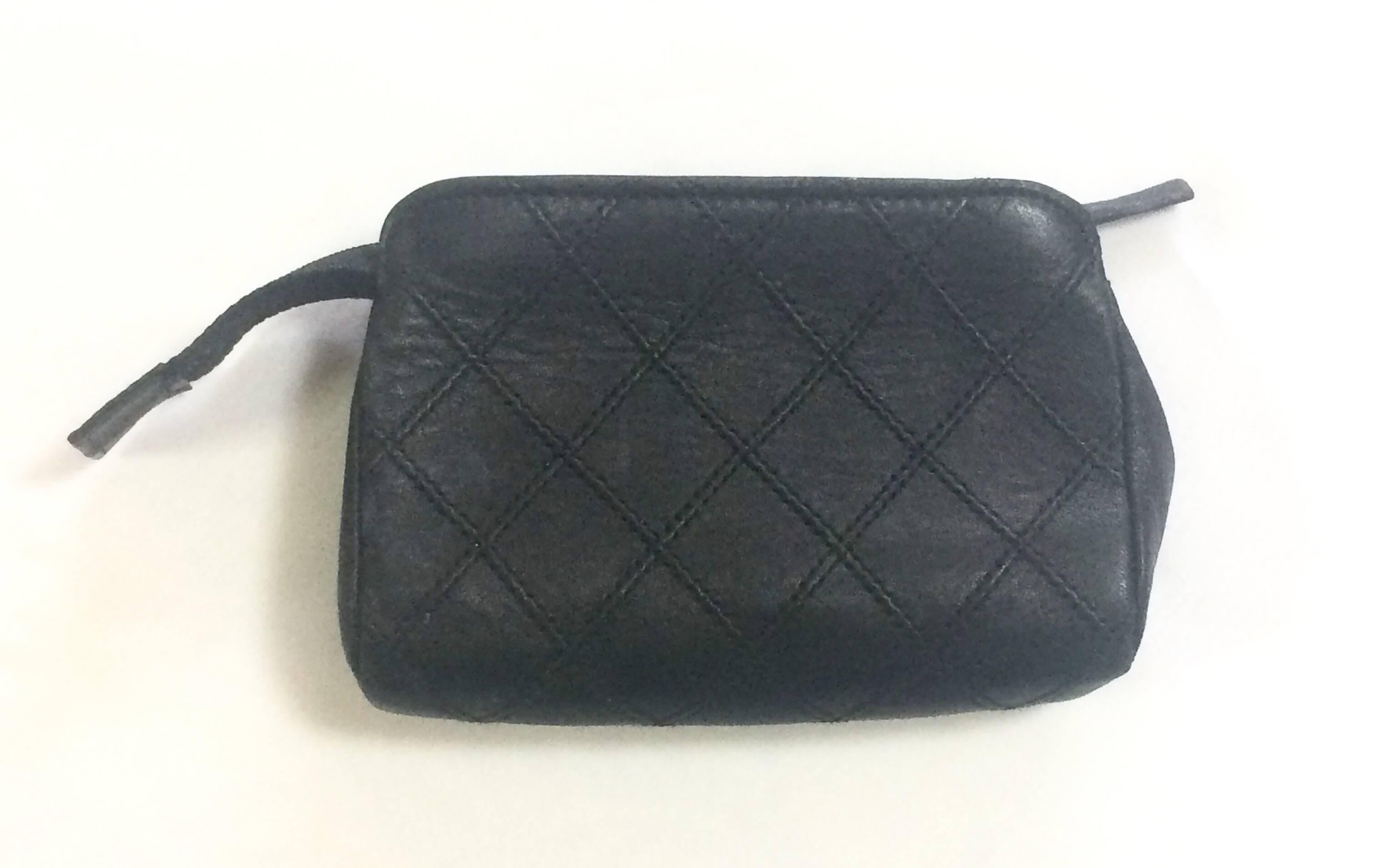 Black Vintage CHANEL black goat leather mini makeup pouch, coin case with golden CC.