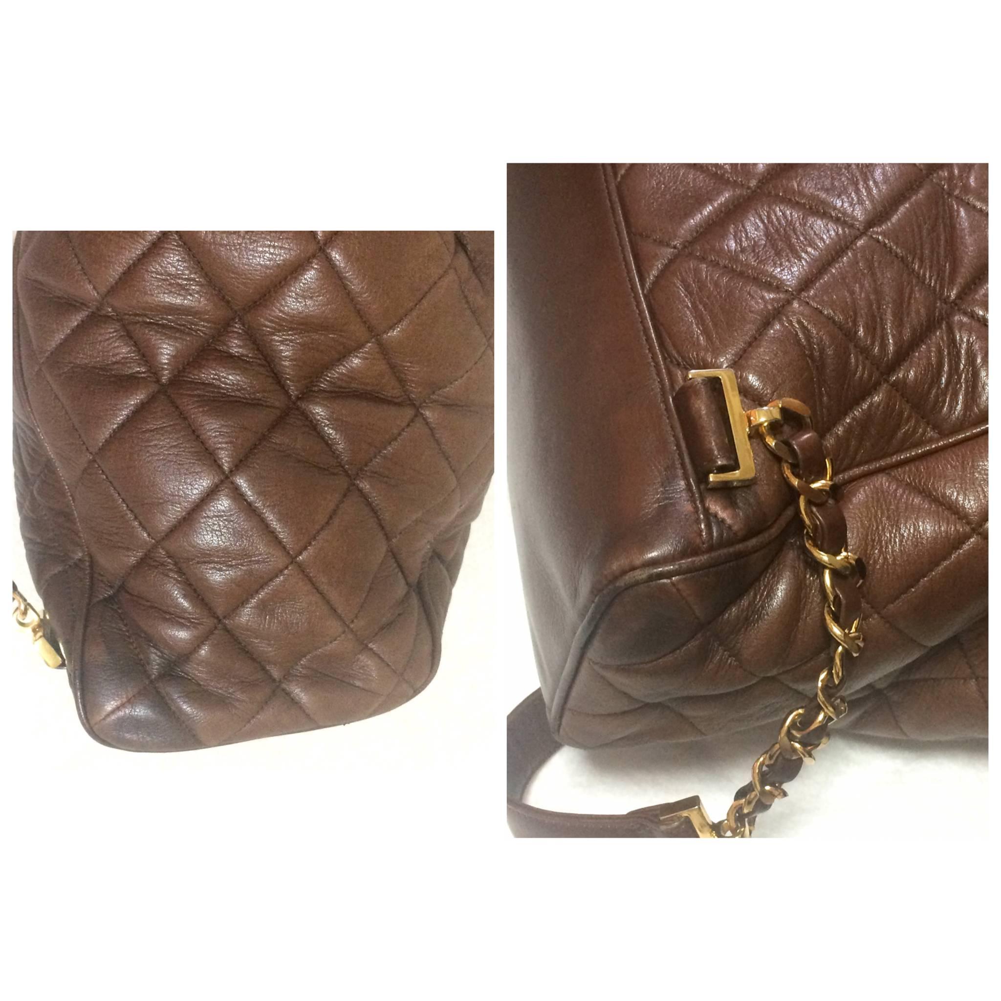 Vintage CHANEL quilted brown lamb leather backpack with gold chain and large CC. For Sale 1