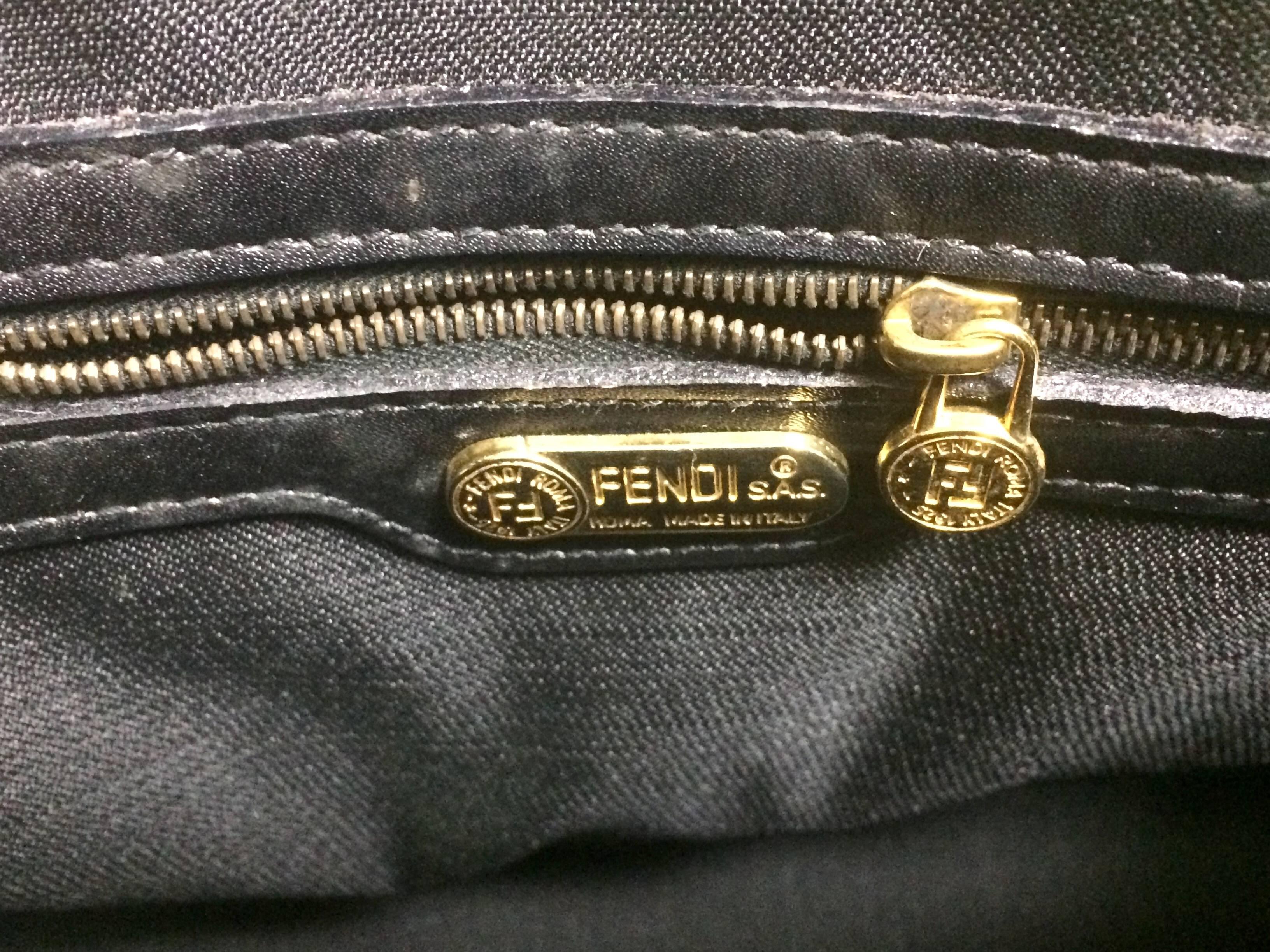 Vintage FENDI classic black and grey pecan vertical stripe bolide shape handbag. 1