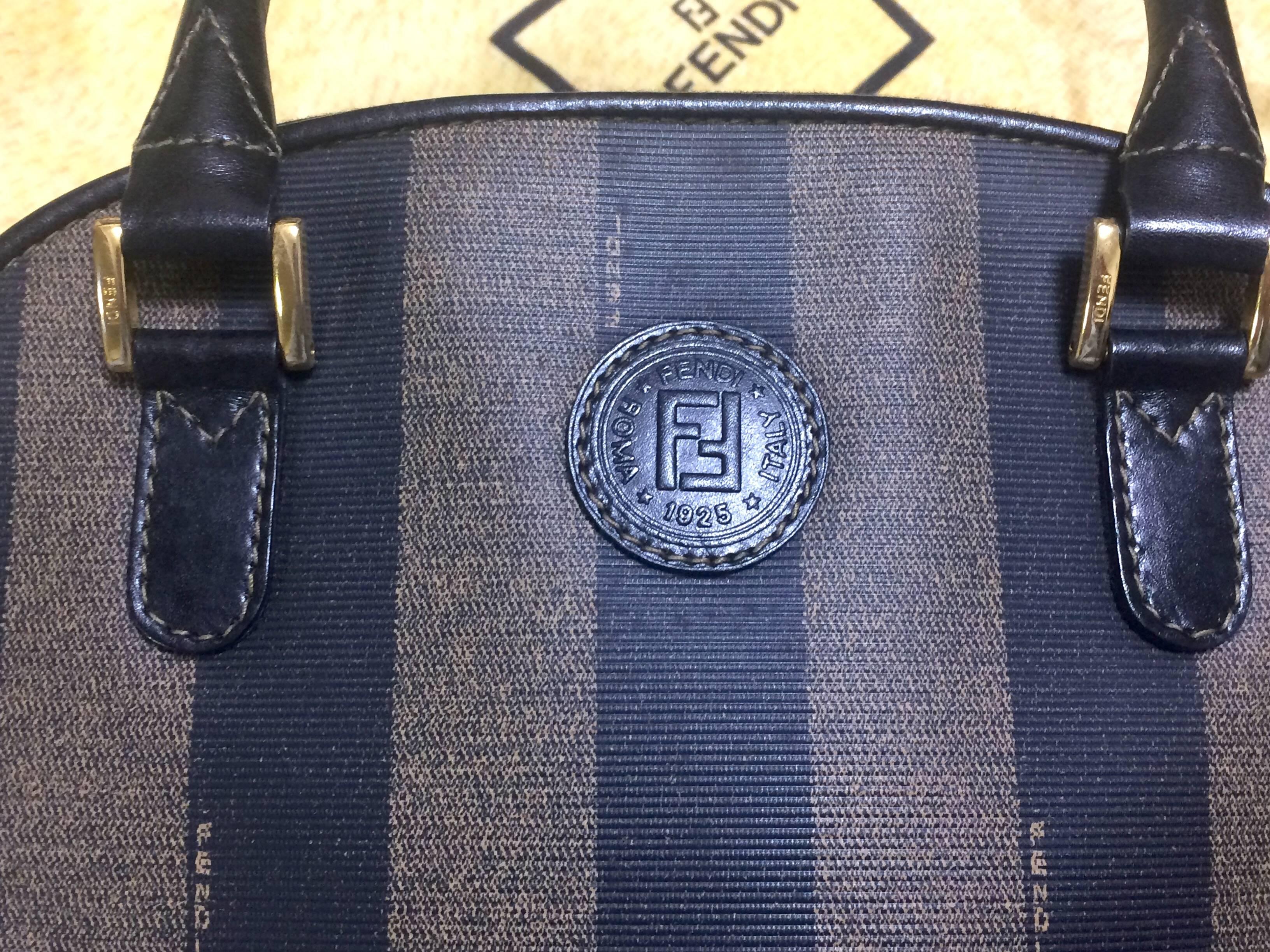 Black Vintage FENDI classic black and grey pecan vertical stripe bolide shape handbag.