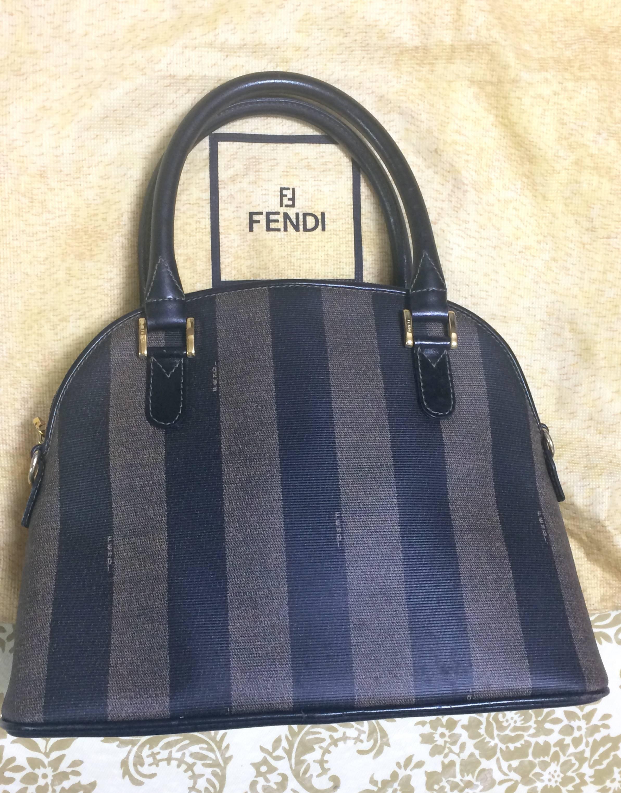 Women's Vintage FENDI classic black and grey pecan vertical stripe bolide shape handbag.