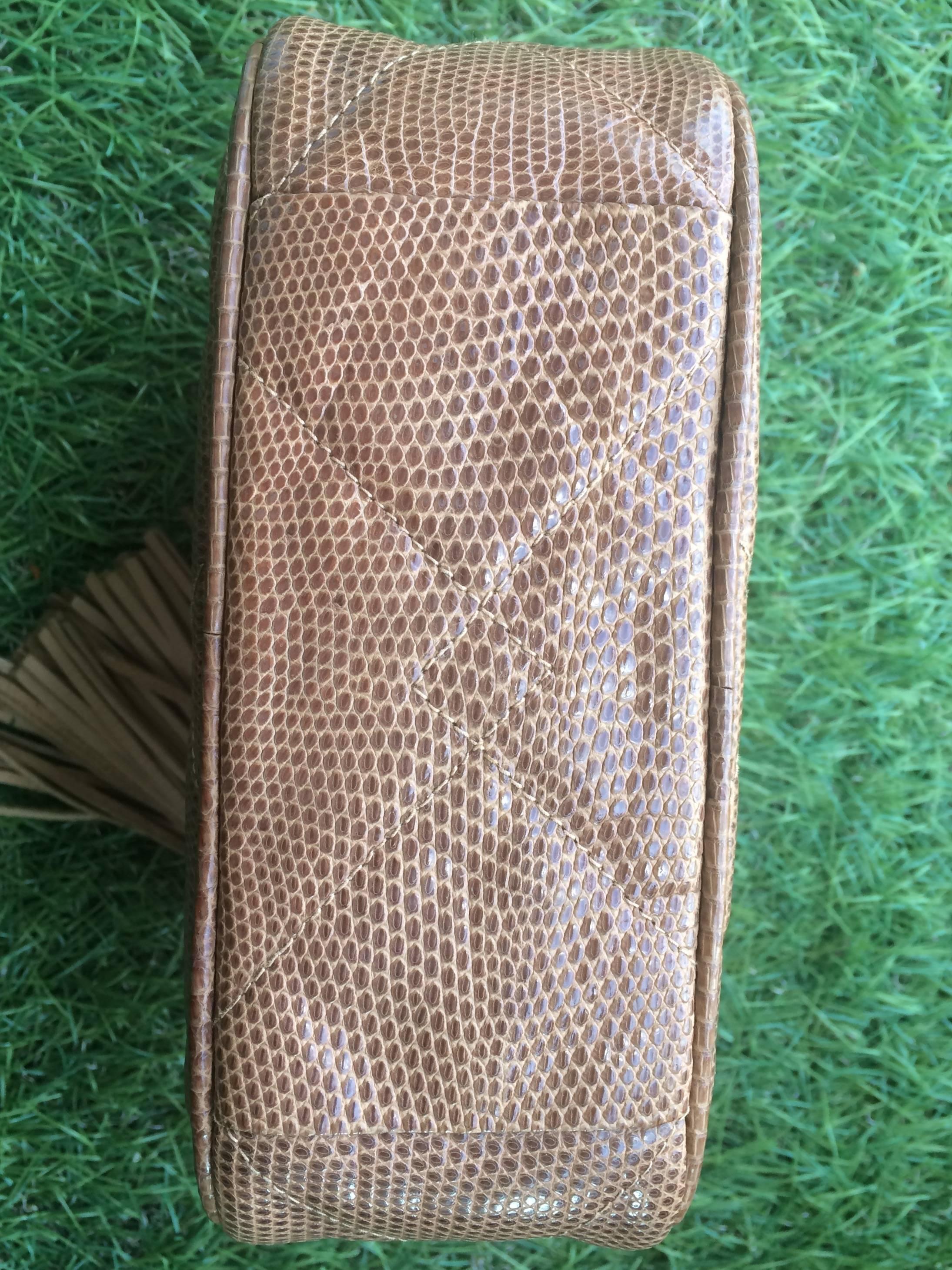 Vintage CHANEL brown lizard camera bag type clutch bag with fringe and CC mark. For Sale 1