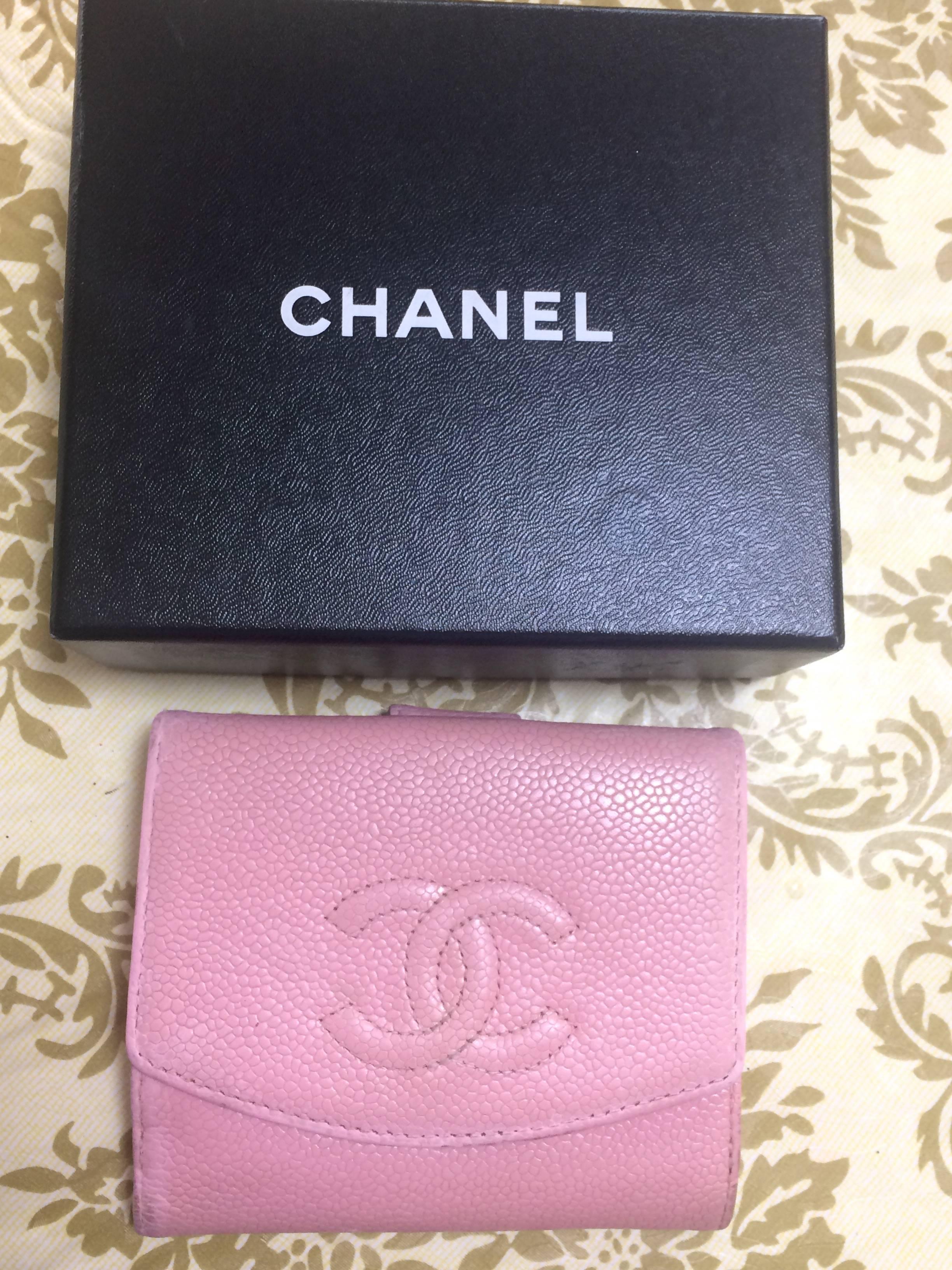 Vintage CHANEL milky pink caviar leather wallet with stitched CC mark. Classic piece.

This is a CHANEL vintage wallet in milky pink caviar leather. 
Mod, simple and so chic!
 It is something that would never go out of style.
The CC stitched mark at