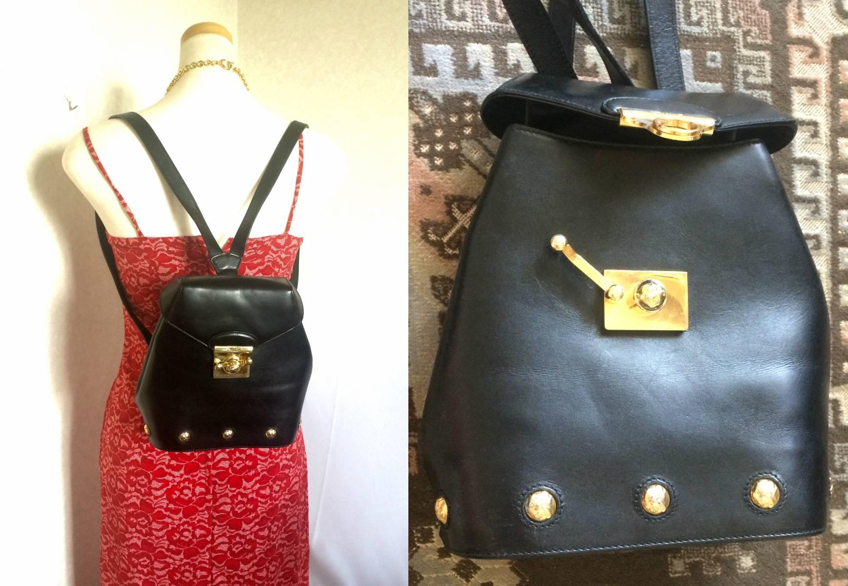 Vintage Salvatore Ferragamo black calf leather backpack with golden motif 5