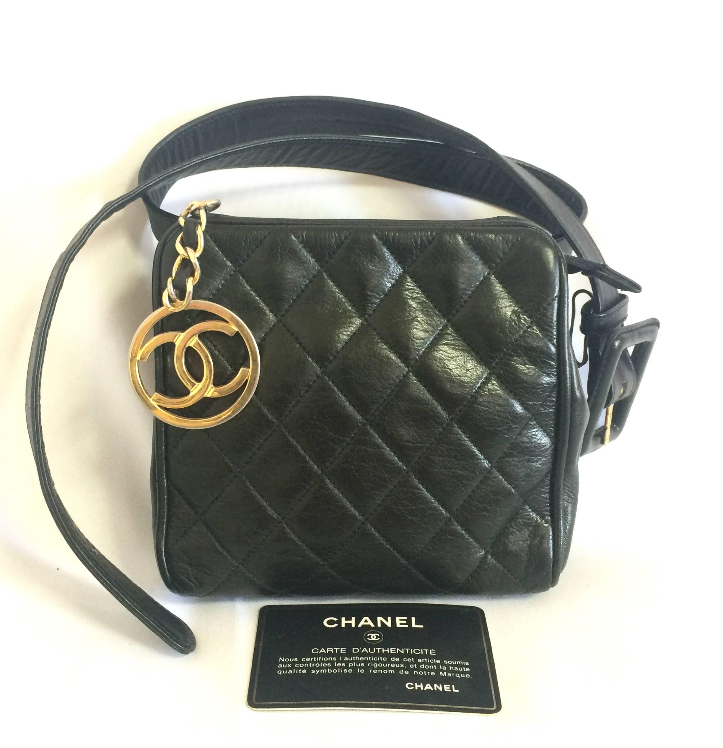 1990s.Vintage CHANEL black lambskin square shape waist purse, fanny pack with golden round CC closure motif. 28