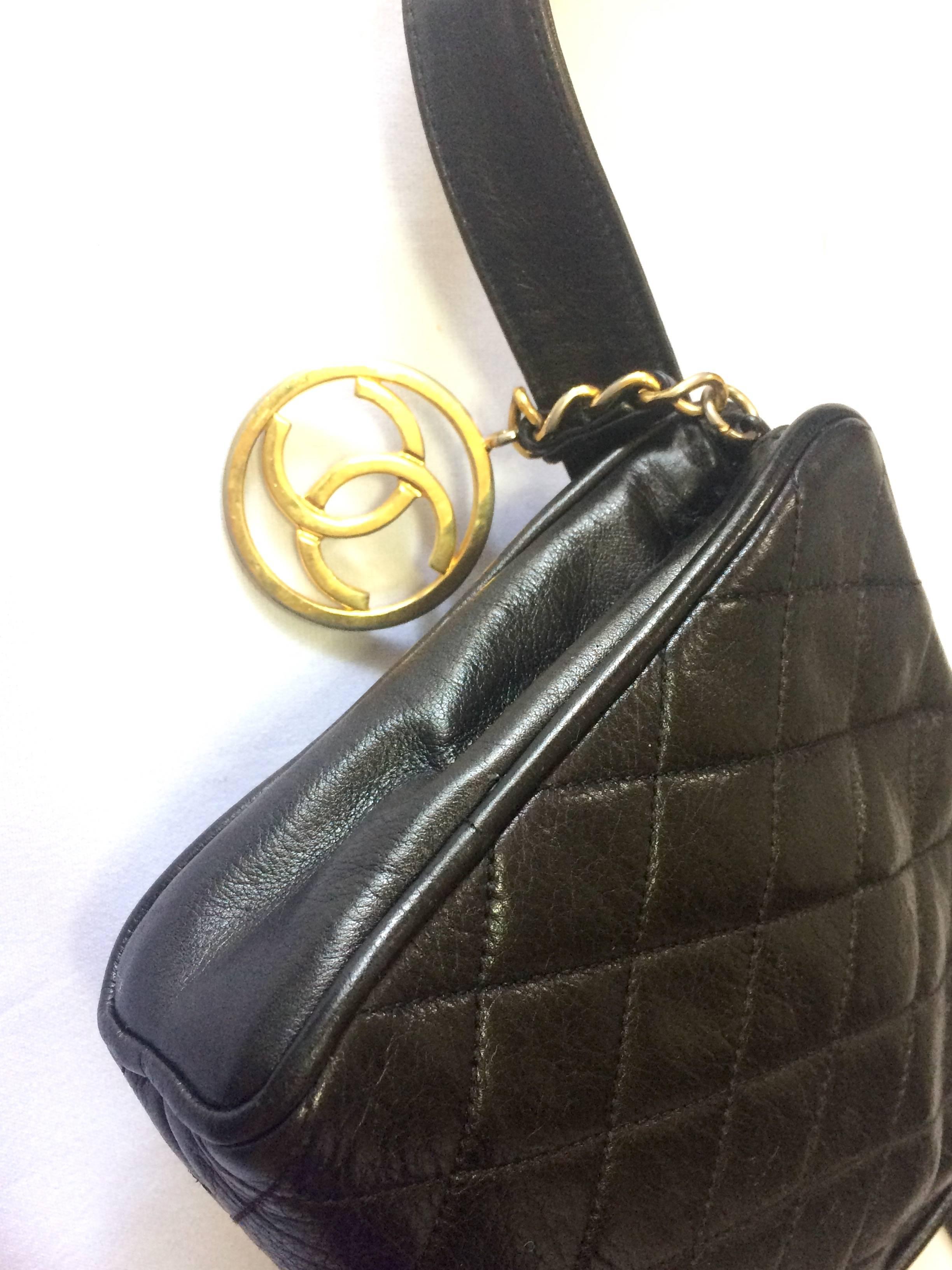 Vintage CHANEL black lambskin square shape fanny pack with golden round CC motif For Sale 1