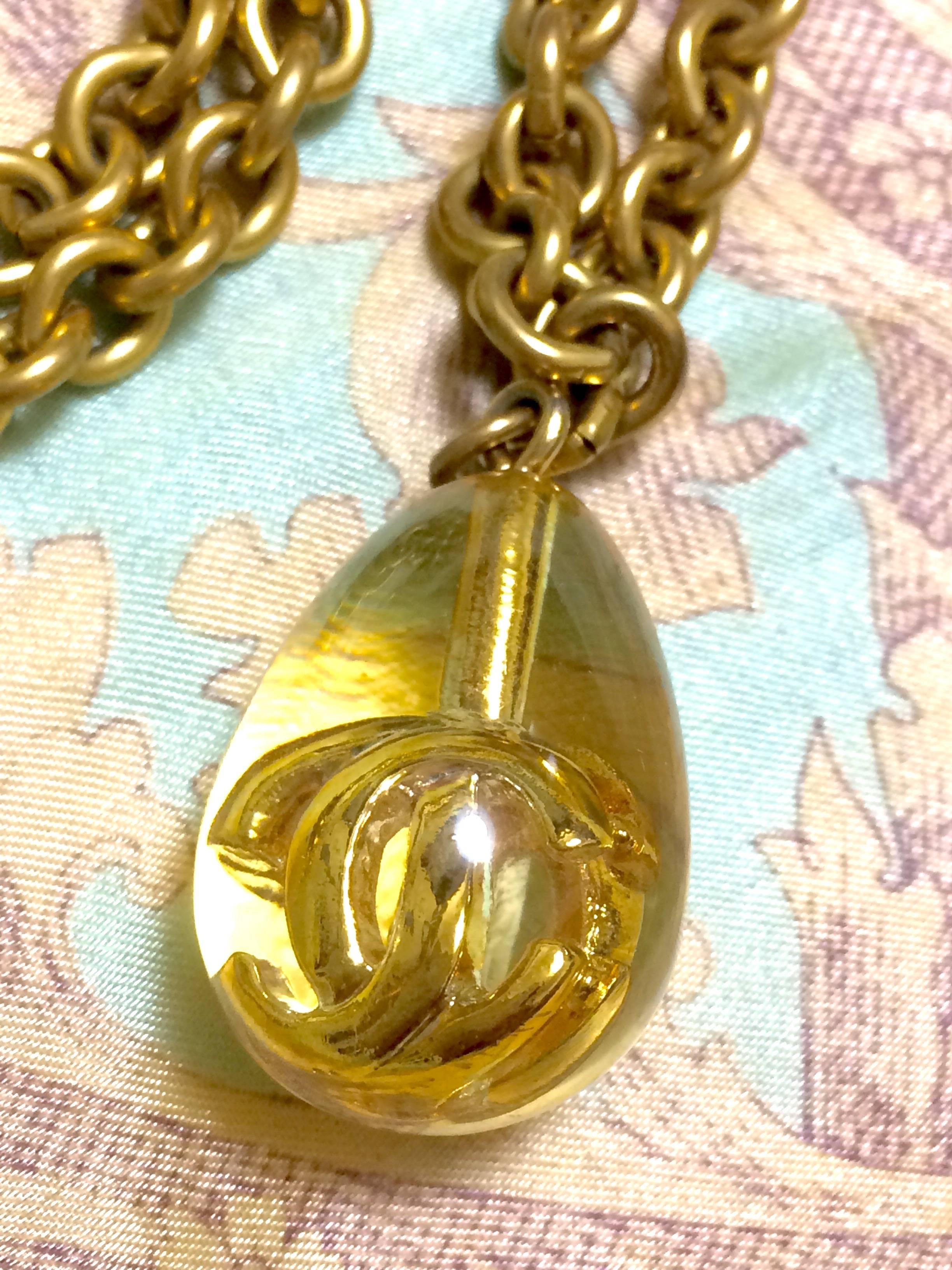 Vintage CHANEL long chain necklace with clear and gold teardrop CC pendant top. For Sale 2
