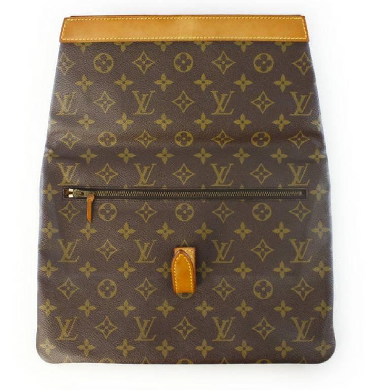 Brown 70's vintage Louis Vuitton monogram envelope style document portfolio purse.