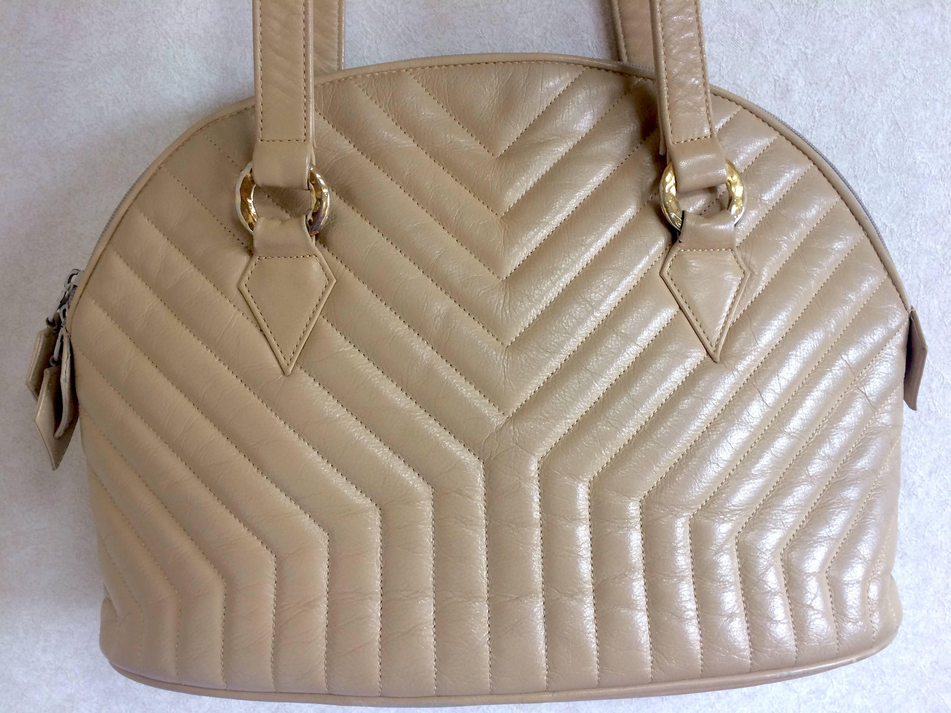 Women's Vintage Yves Saint Laurent beige bolide shape shoulder bag. Y, Chevron stitches