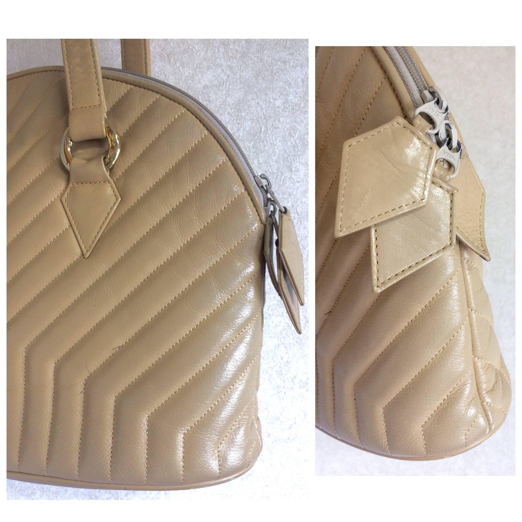 Vintage Yves Saint Laurent beige bolide shape shoulder bag. Y, Chevron stitches 2