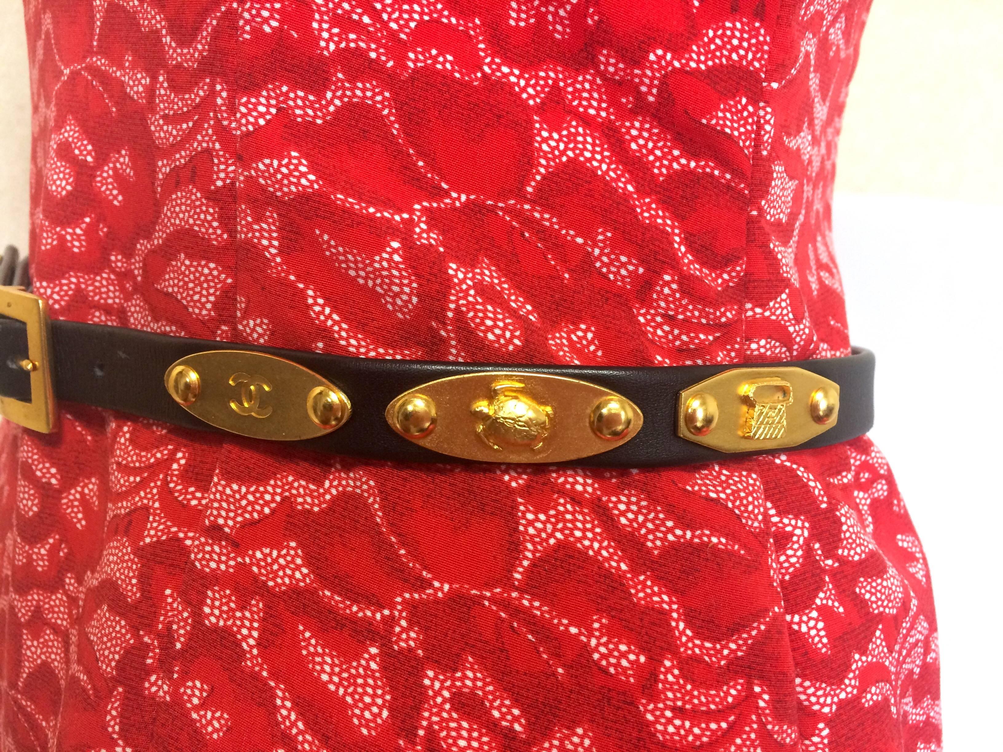 Black Vintage CHANEL black belt with CC, camellia flower, turtle, perfume, clover...