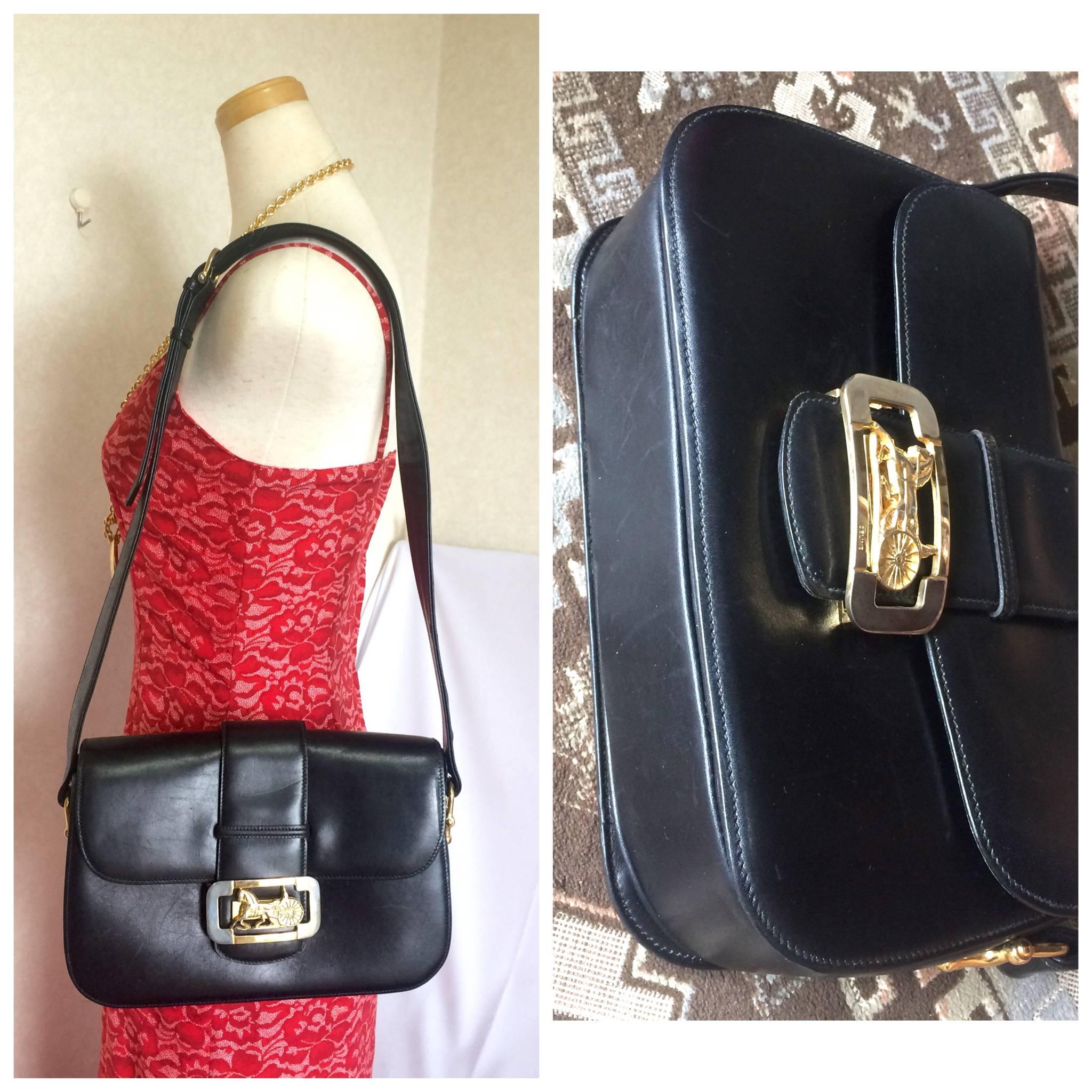 Vintage Celine black leather classic shoulder bag with golden logo closure. 5