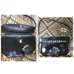 Vintage Christian Dior black leather large clutch, shoulder bag with trotter.
