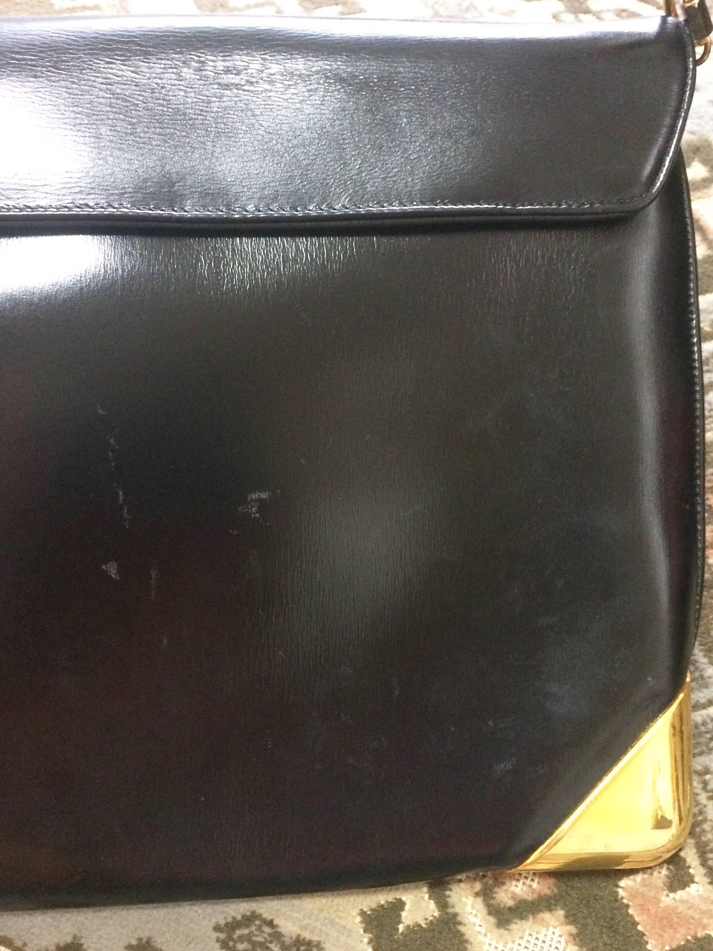 Black Vintage Christian Dior black leather large clutch, shoulder bag with trotter.