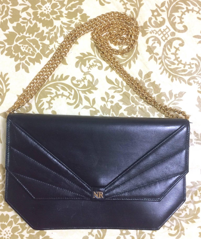 Vintage Nina Ricci black leather chain clutch shoulder bag with a bow ...
