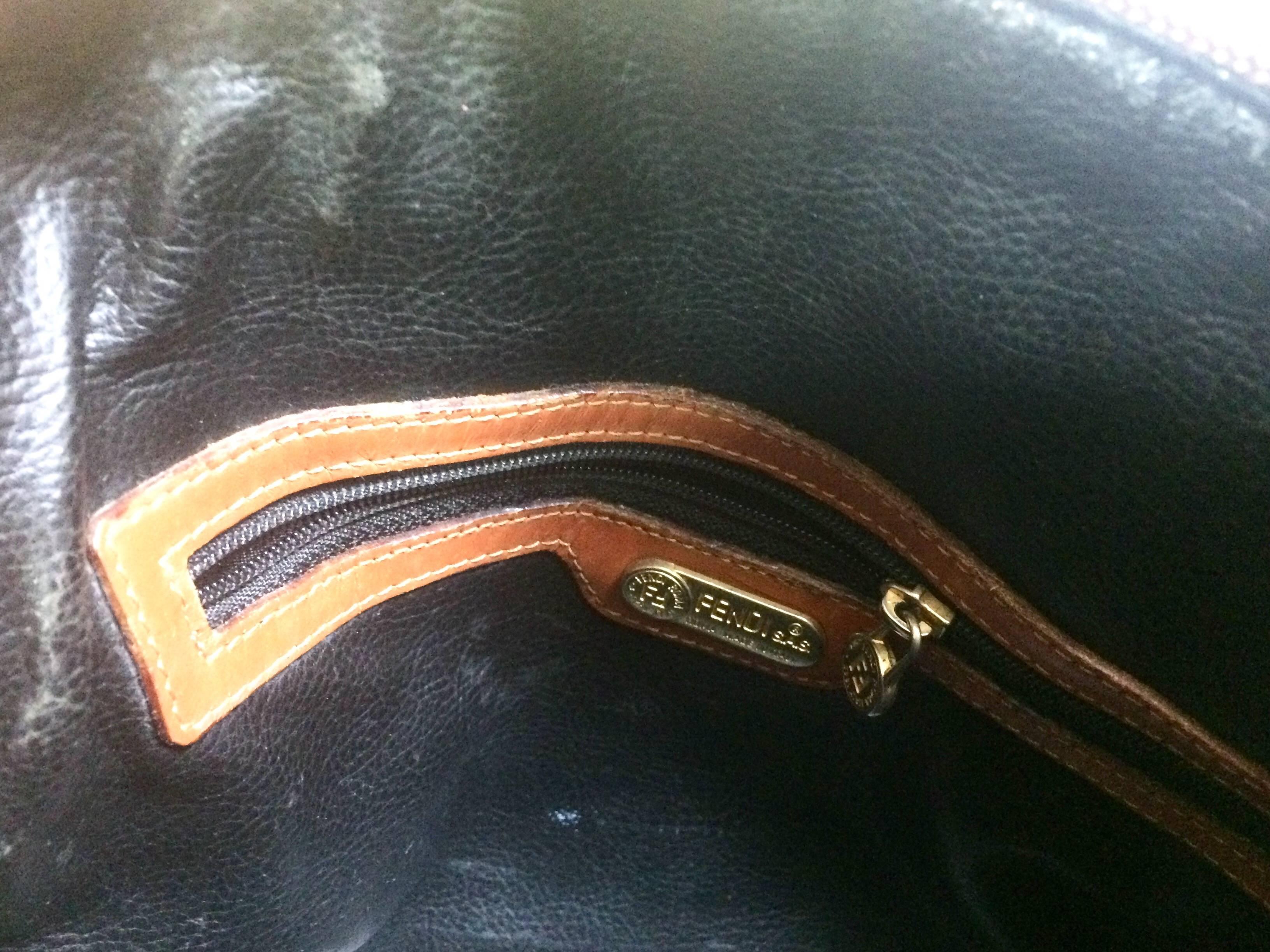 Vintage FENDI black and grey pecan stripe bolide shape bag with brown handles. For Sale 2