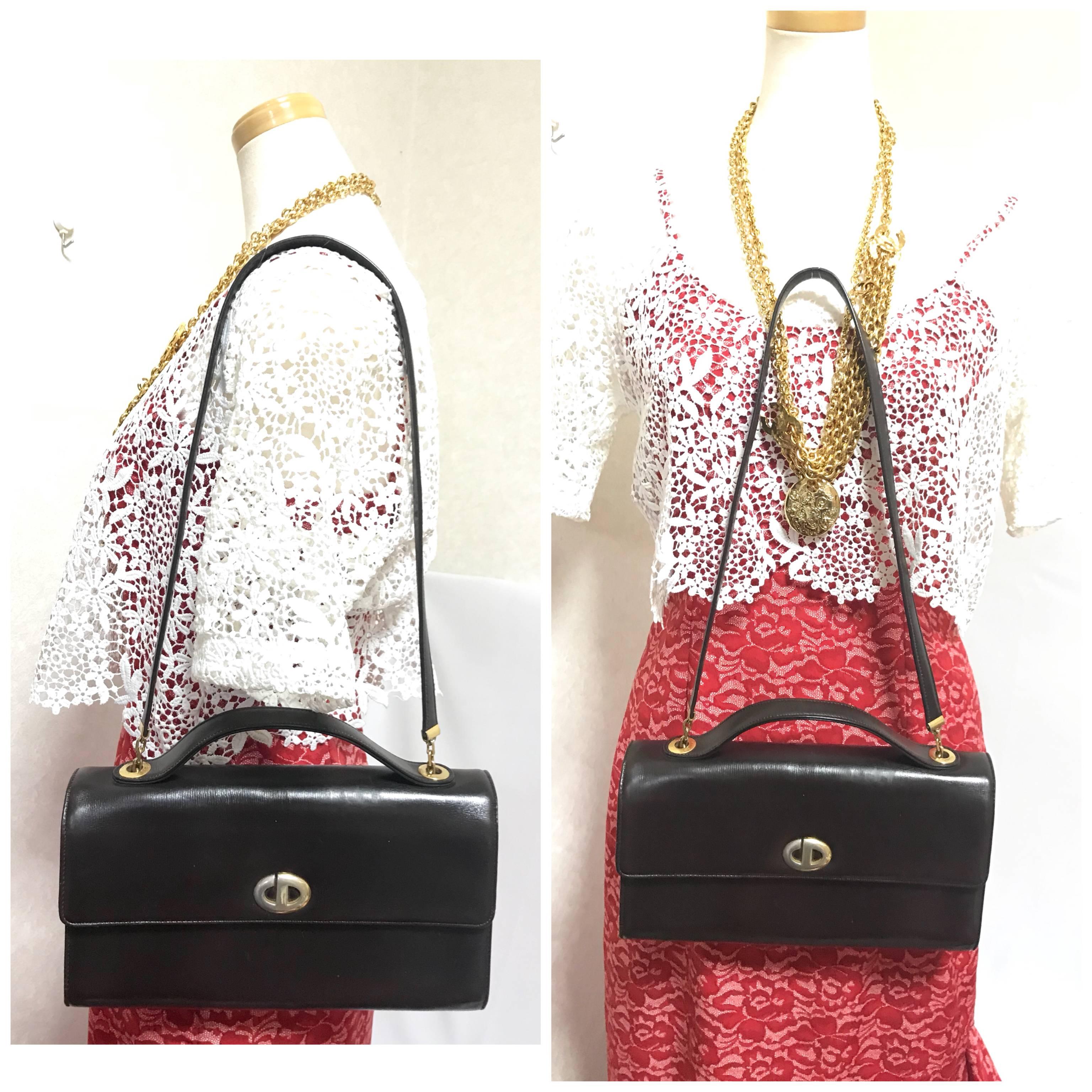 Vintage Christian Dior dark brown leather shoulder bag with CD motif and strap. For Sale 7