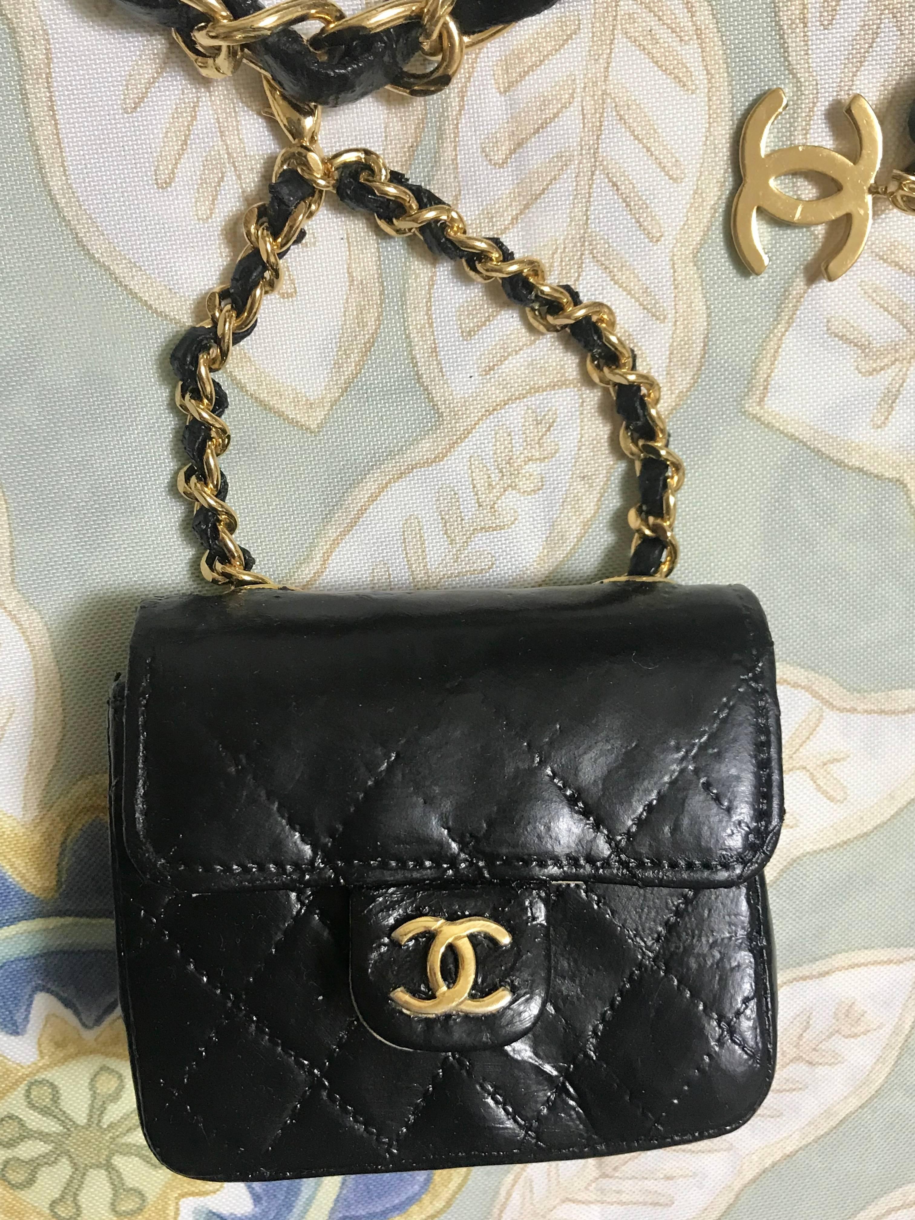 1980s. Vintage CHANEL lambskin mini 2.55 bag charm chain leather belt with golden CC charm. Must have.

Vintage CHANEL black lambskin mini 2.55 bag charm chain leather belt with CC motif.

Here is another fabulous piece from CHANEL back in the era