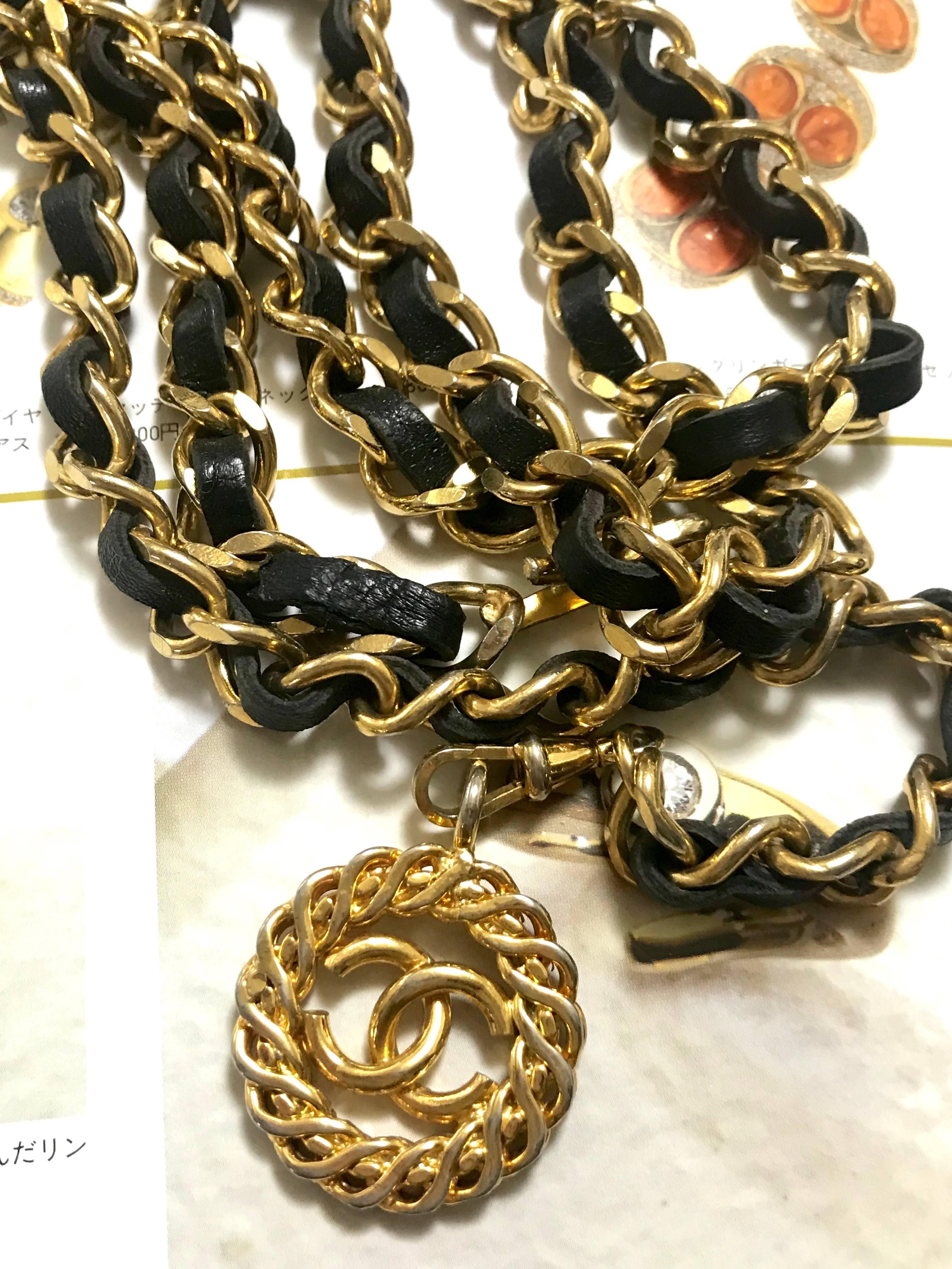 Vintage CHANEL golden chain and black belt/necklace with flower CC mark charm.  1