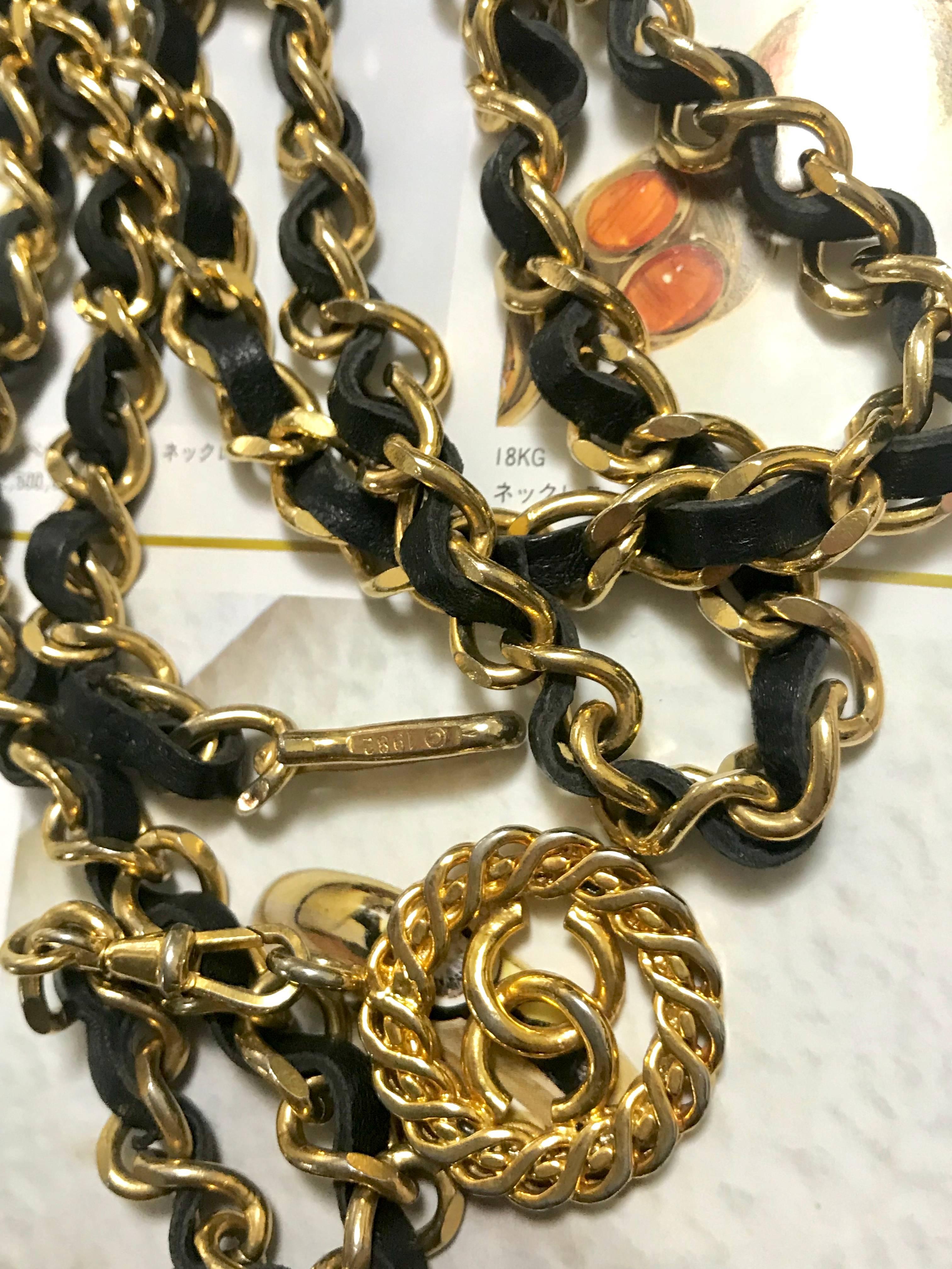 Vintage CHANEL golden chain and black belt/necklace with flower CC mark charm.  2