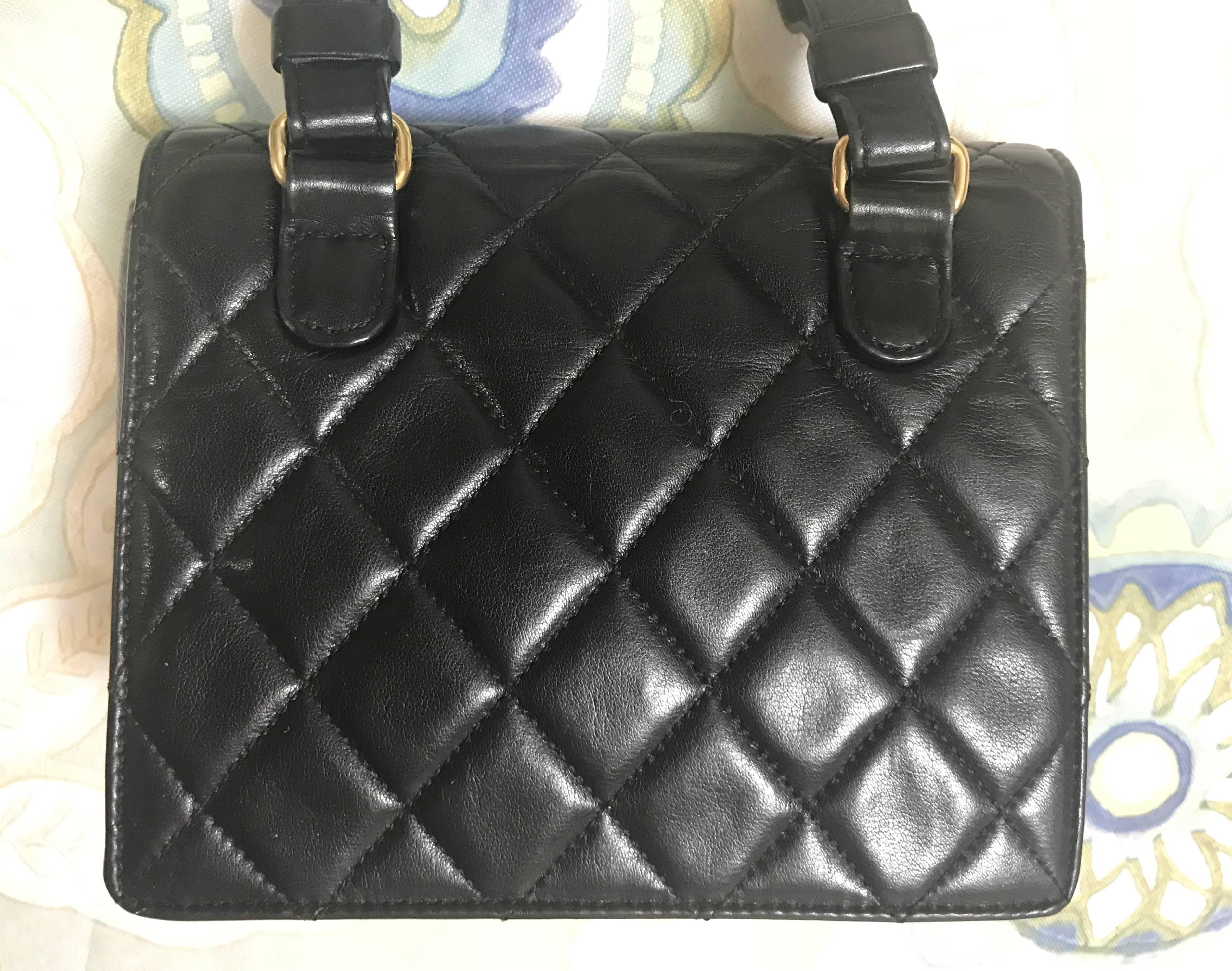 Black Vintage CHANEL square black lambskin waist purse, fanny pack pouch and belt set.
