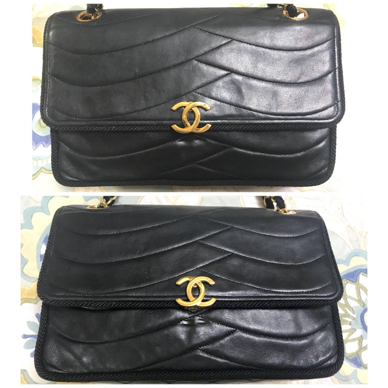 Chanel Vintage black 2.55 shoulder bag with wavy stitches and rope strings.