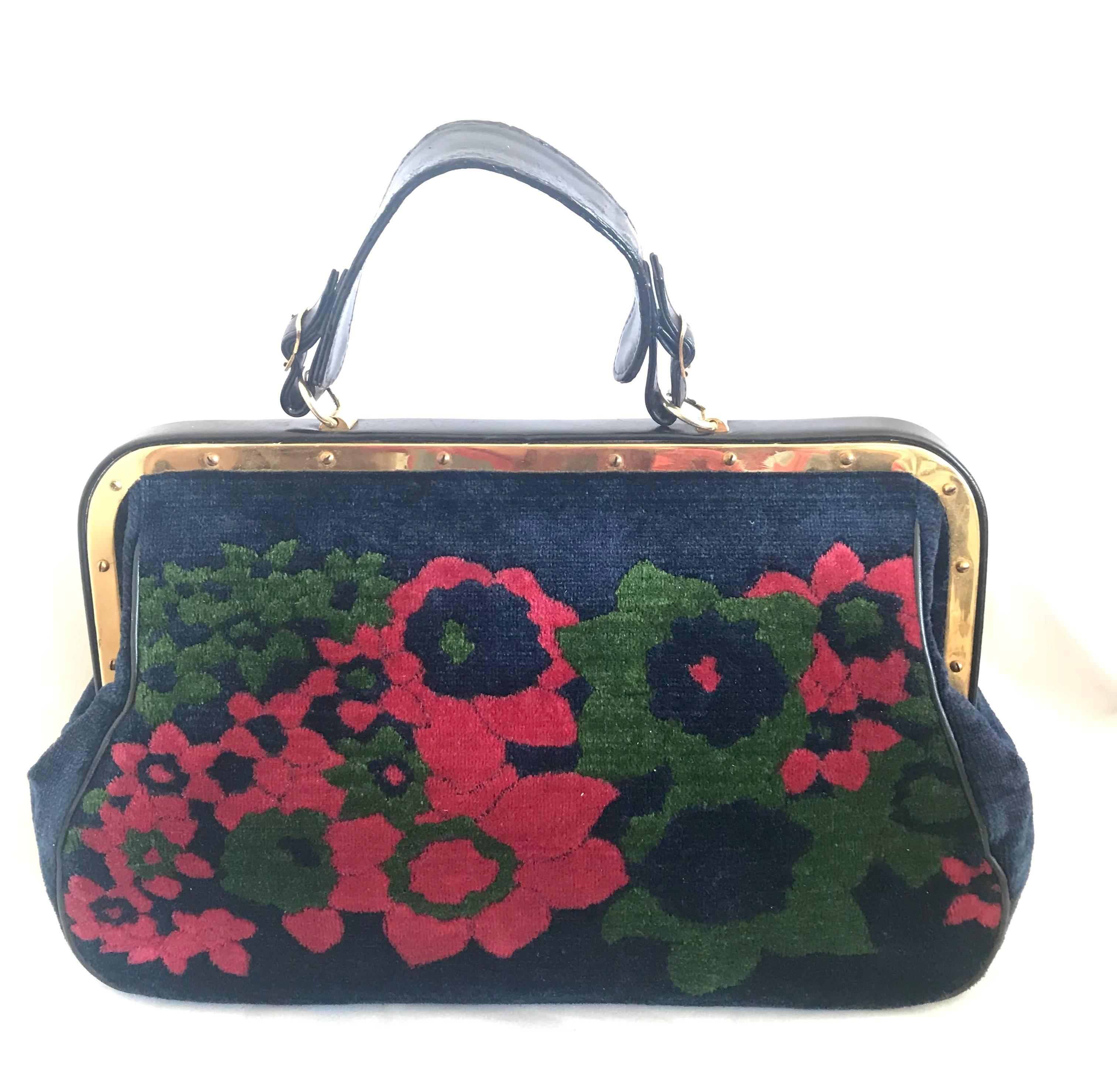1970's, 80's vintage Roberta di Camerino red, green, and navy velvet and leather doctor bag with flower weaving and gold charm. Rare masterpiece.       

For all Roberta vintage lovers, this purse is the one for you!
Introducing one of the rarest