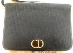 Vintage Christian Dior black logo jacquard shoulder bag, clutch with gold motif.