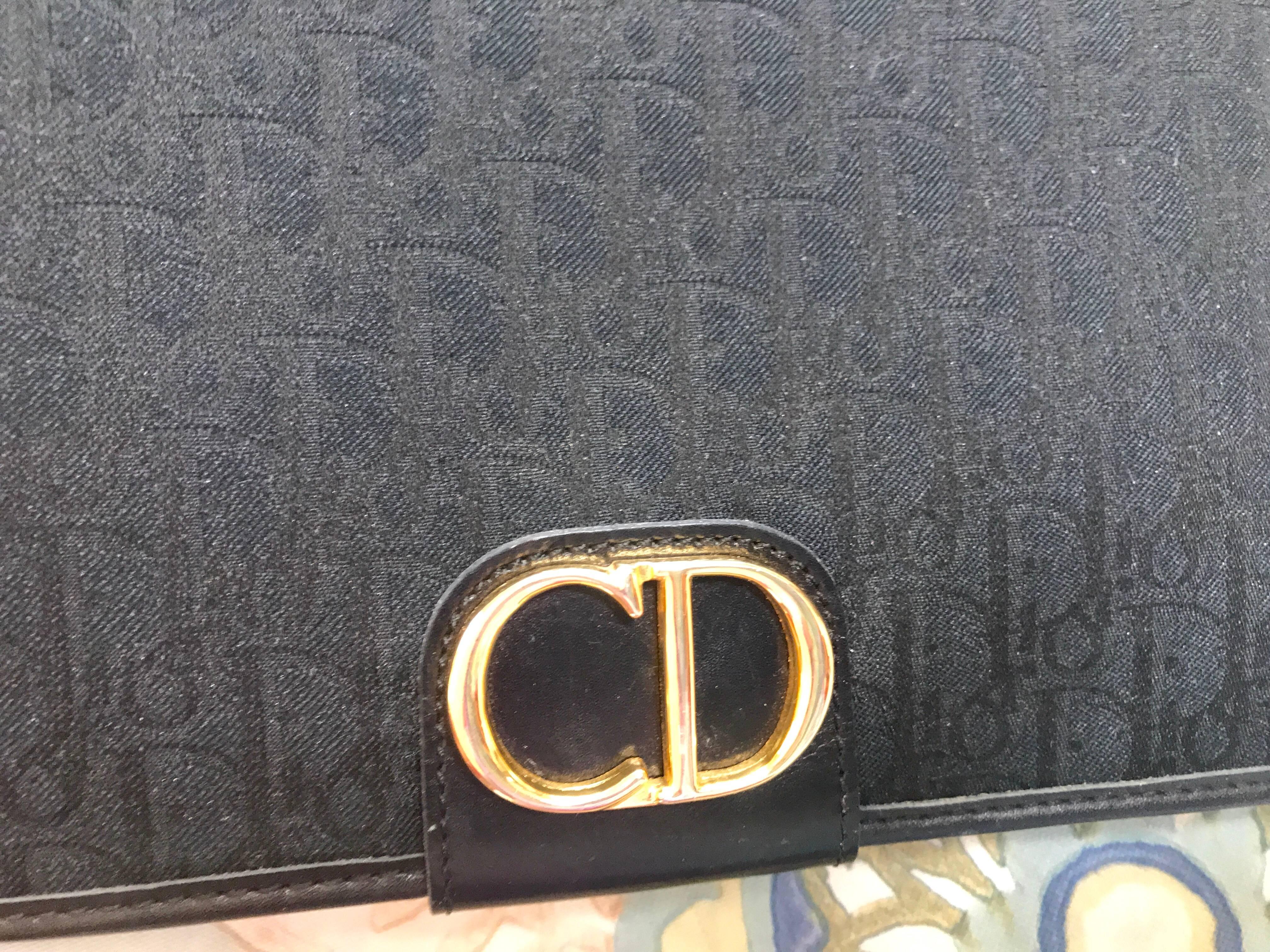 Vintage Christian Dior black logo jacquard shoulder bag, clutch with gold motif. For Sale 1