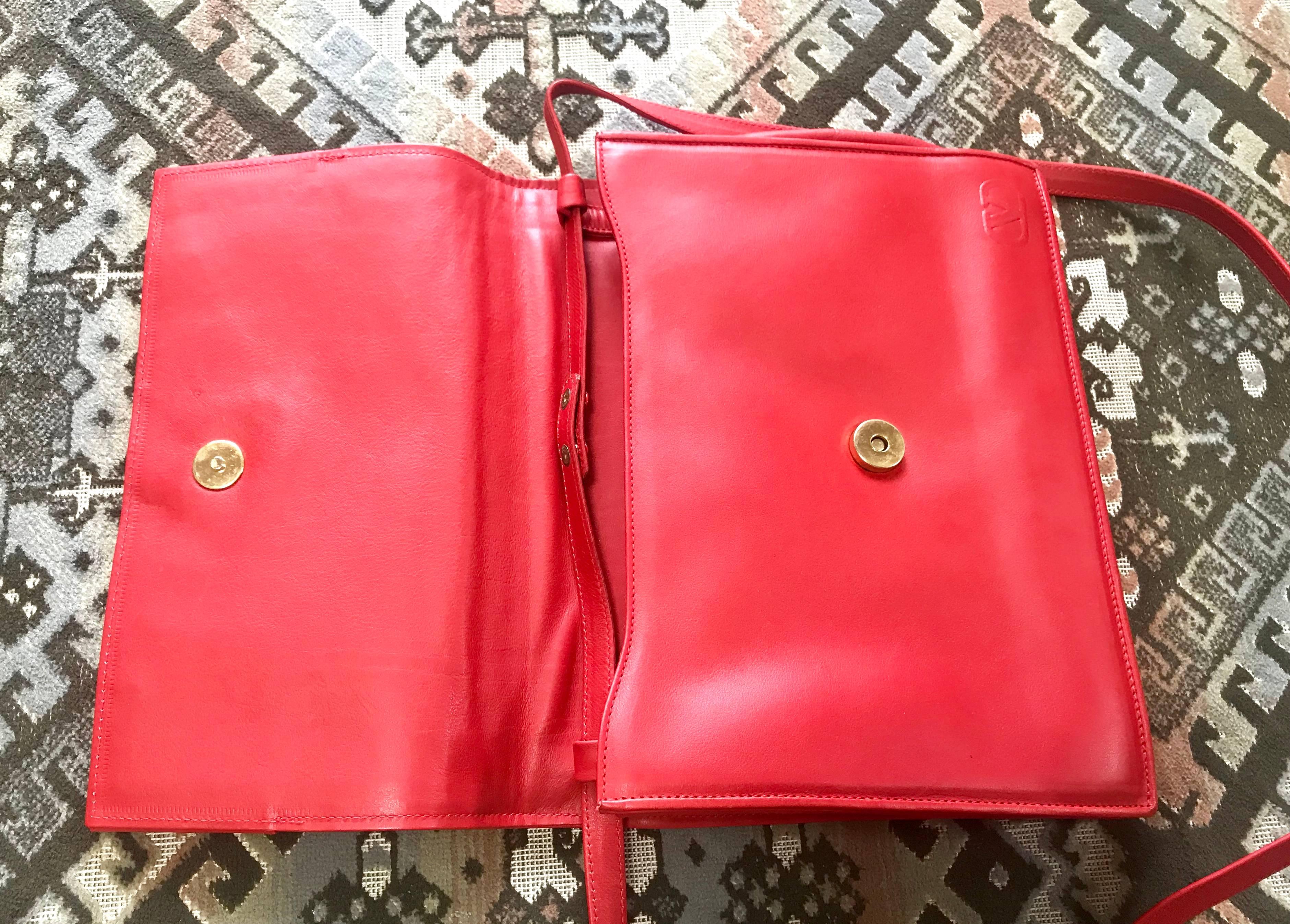 Vintage Valentino Garavani orange red leather clutch shoulder bag with buckle. For Sale 1