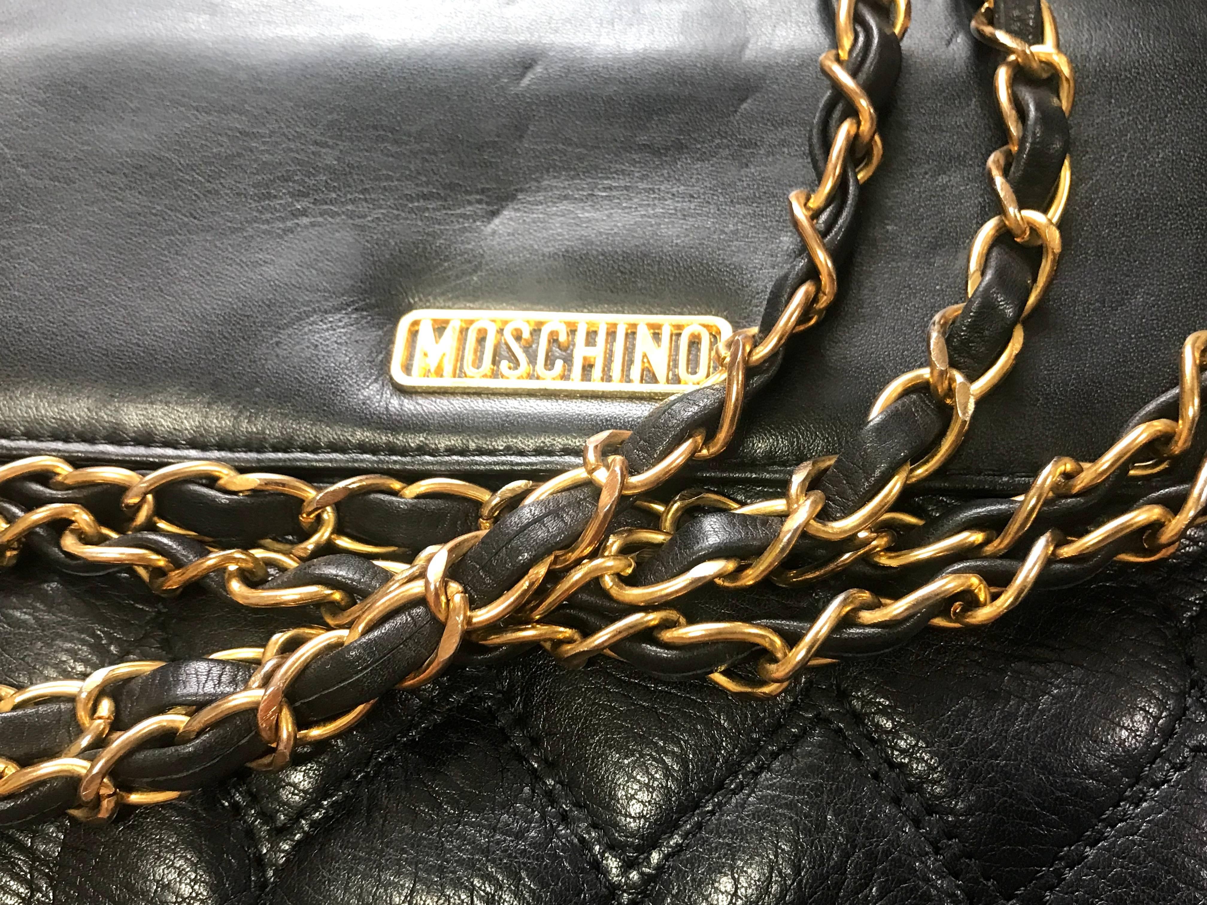 Black Vintage MOSCHINO black heart shape stitch shoulder bag, fanny pack with chains.