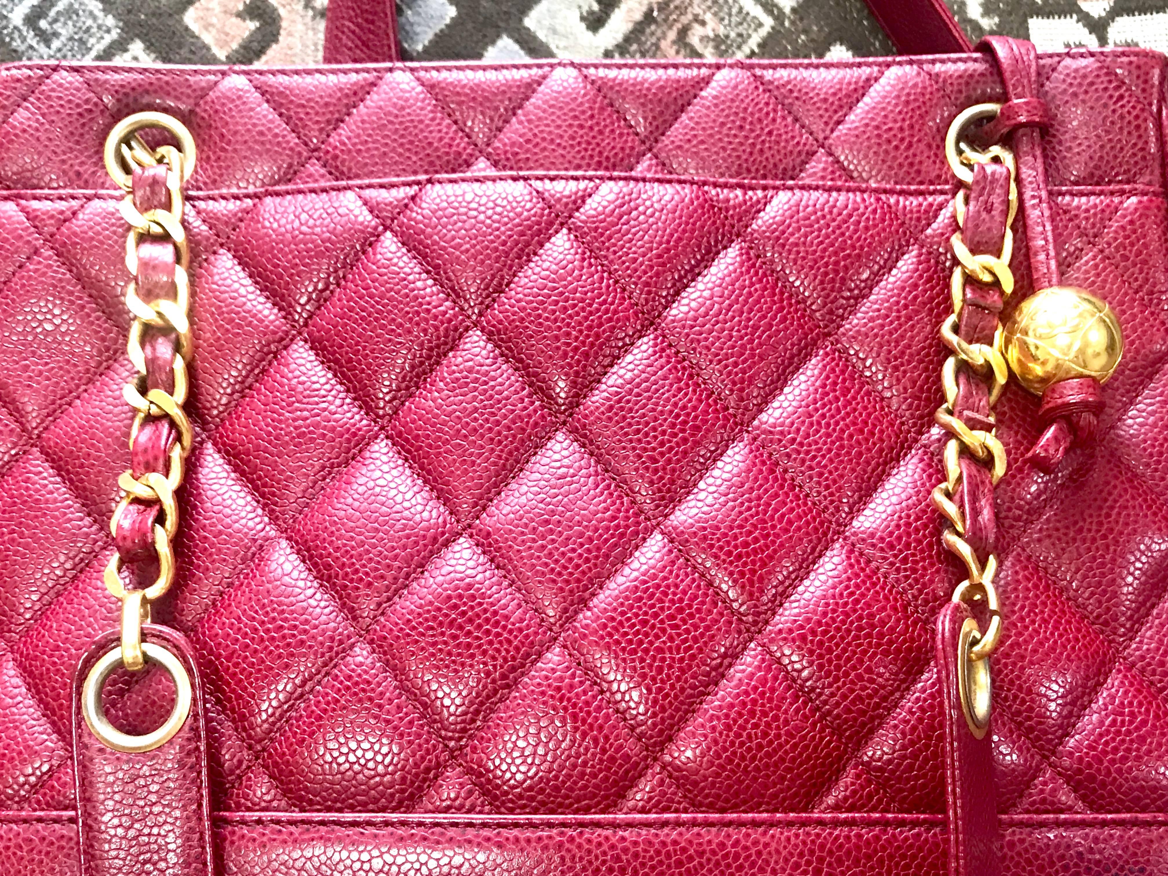 Women's Vintage CHANEL cherry red caviar leather quilted shoulder bag, tote with cc ball For Sale