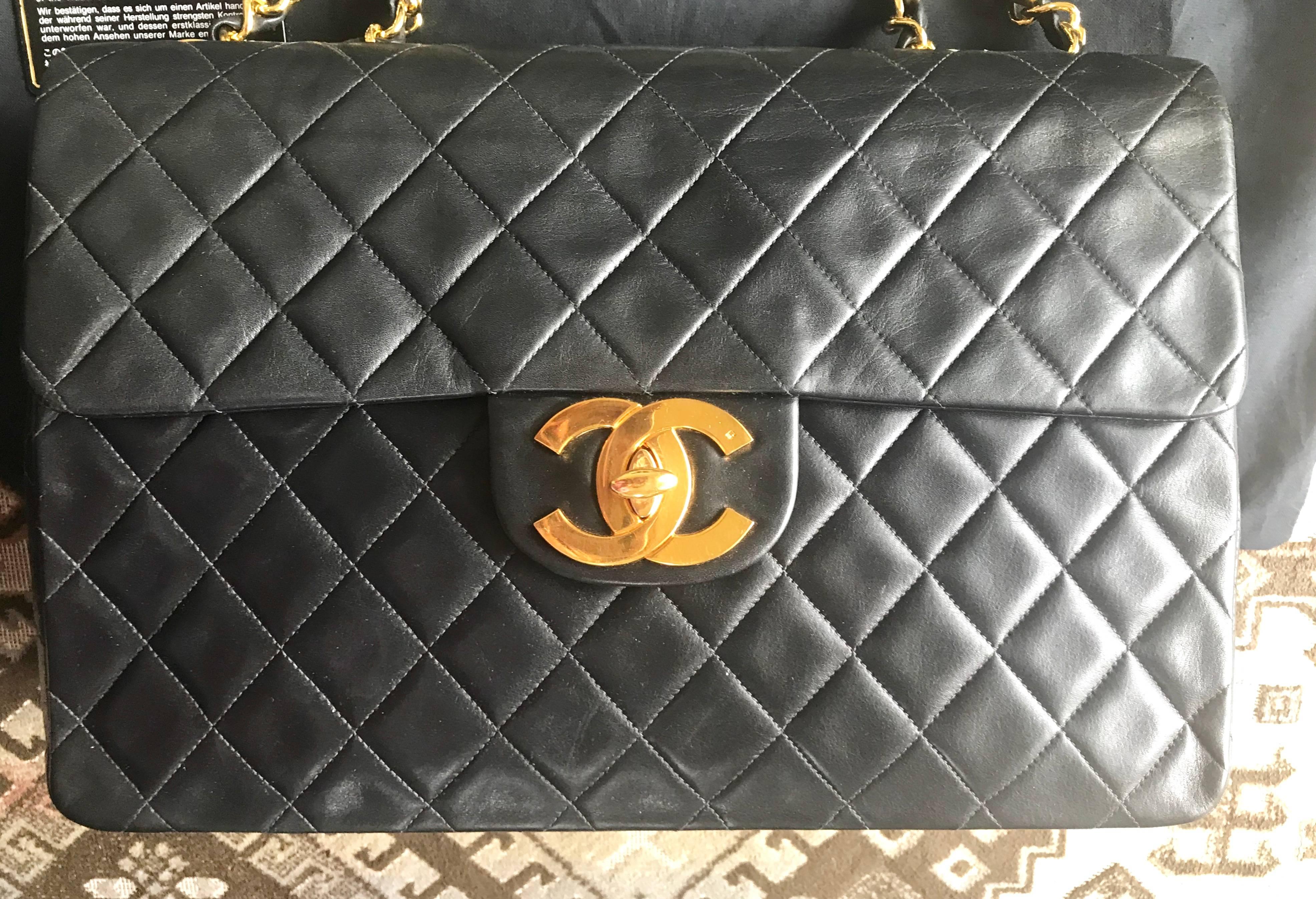 Vintage CHANEL black lamb leather large, jumbo classic flap 2.55 shoulder bag. For Sale 1