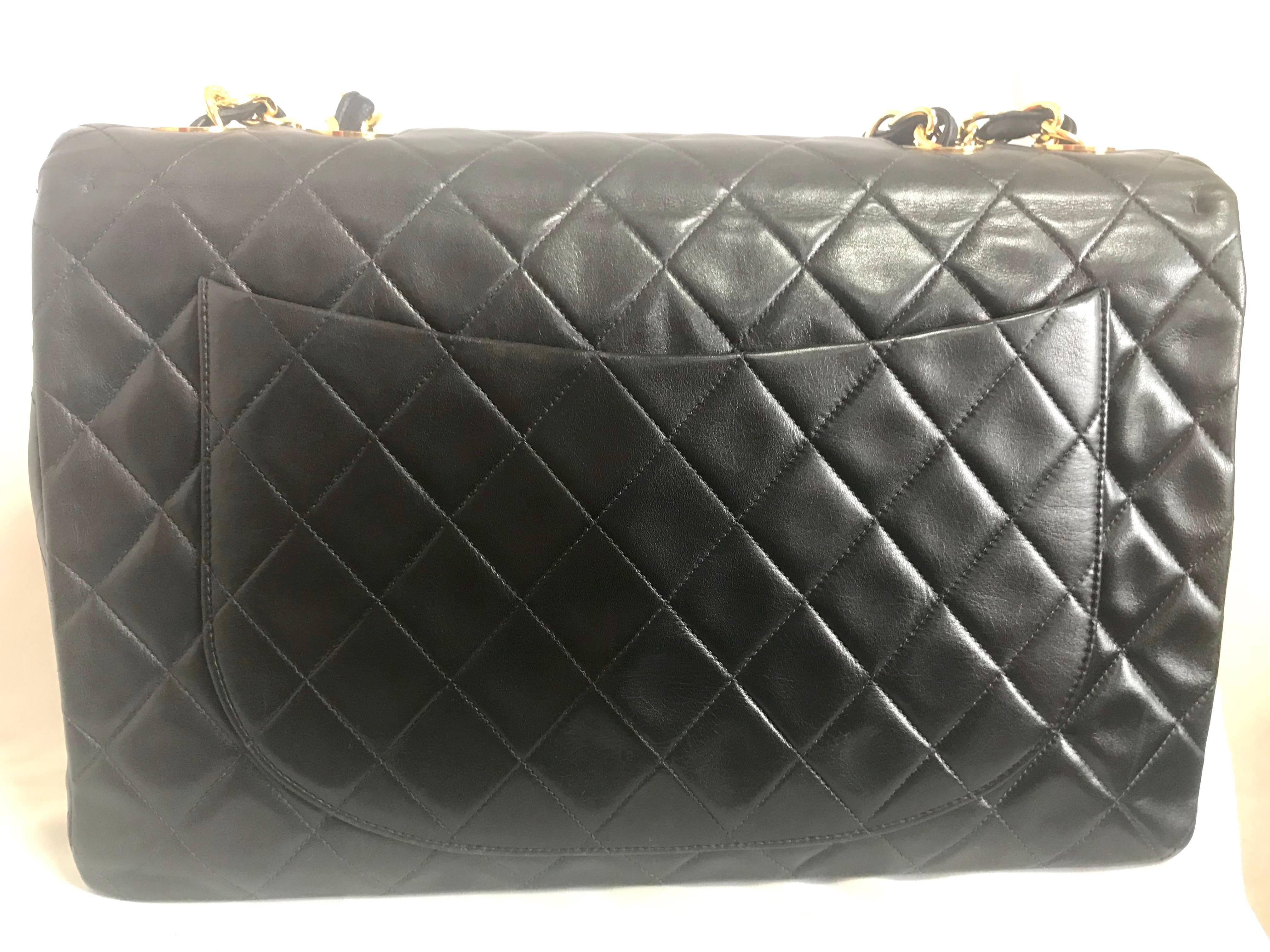 1990s. Vintage CHANEL black lamb leather large, jumbo , classic flap shoulder bag with golden CC closure. 2.55 classic purse.

Introducing another classic masterpiece from CHANEL back in the old era. 
Beautiful vintage condition with little damages