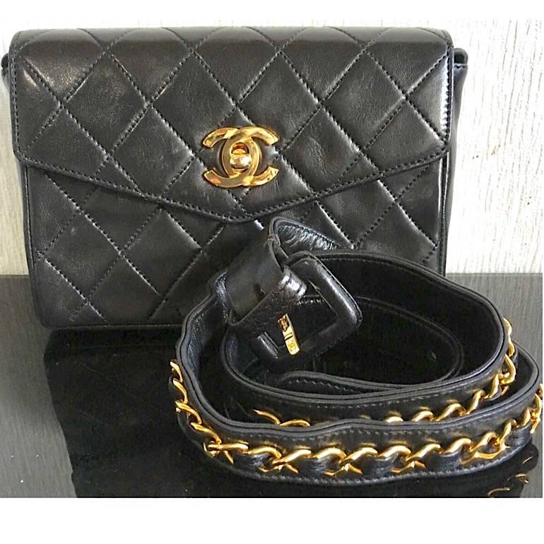 1990s. Vintage CHANEL black leather waist purse, fanny bag with golden chain belt and CC closure hock and CC stitch mark. Belt stamped size: 84/33


Featuring a gold tone CC turn lock closure and CC stitch mark inside the flap. 
Embossed logo on the