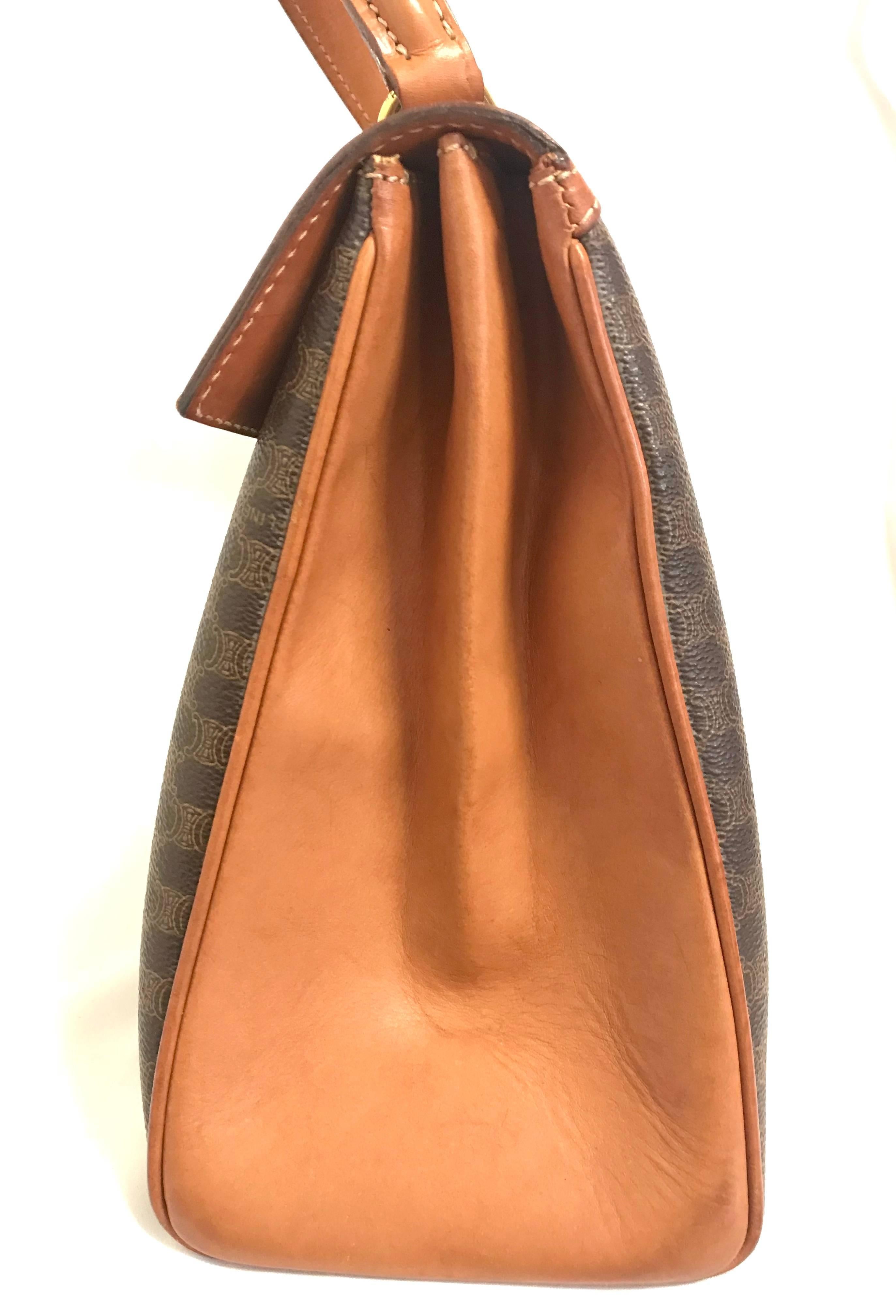 Women's Vintage CELINE brown logo printed Kelly style handbag with golden closure. For Sale