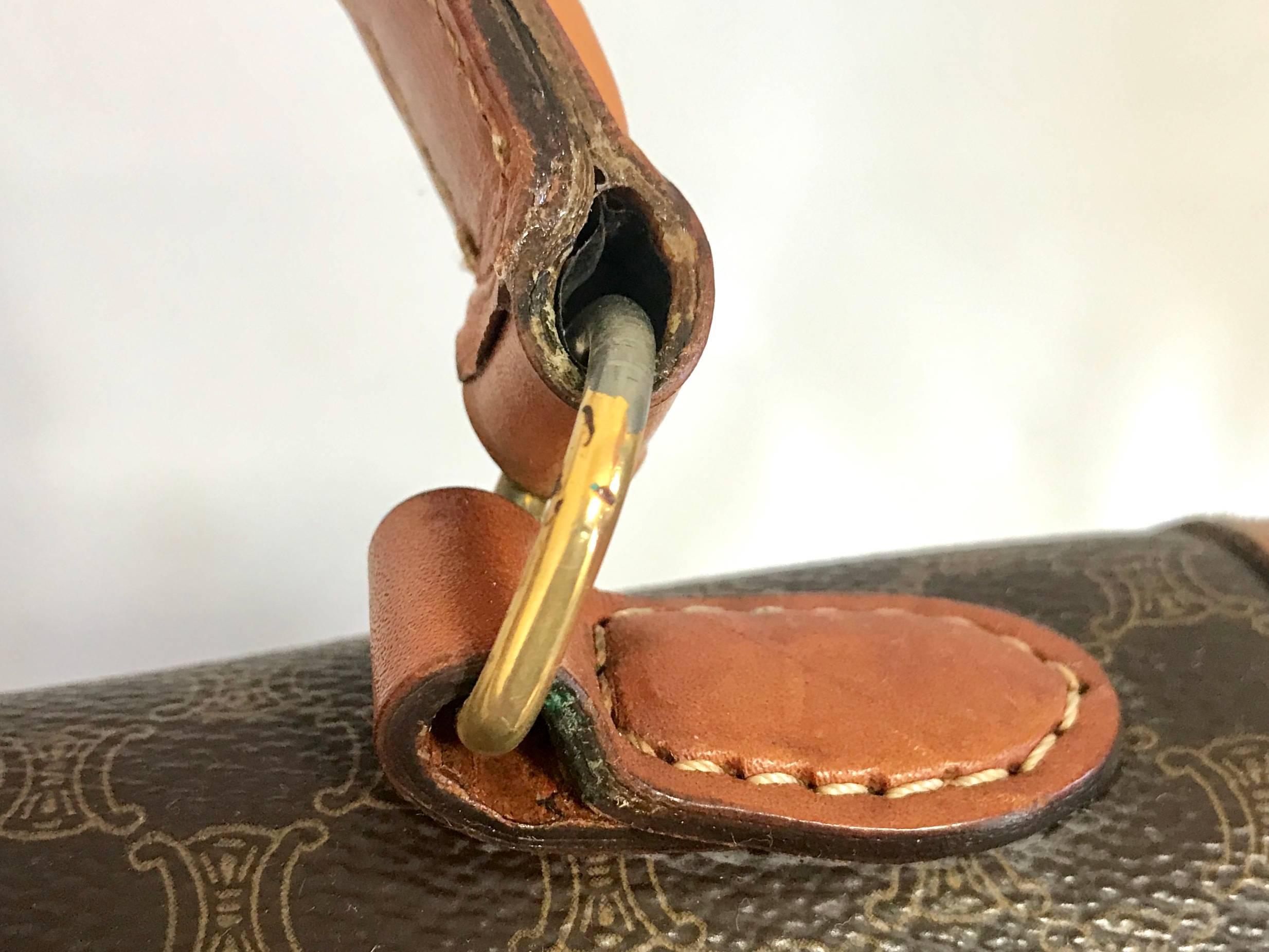 Brown Vintage CELINE brown logo printed Kelly style handbag with golden closure. For Sale