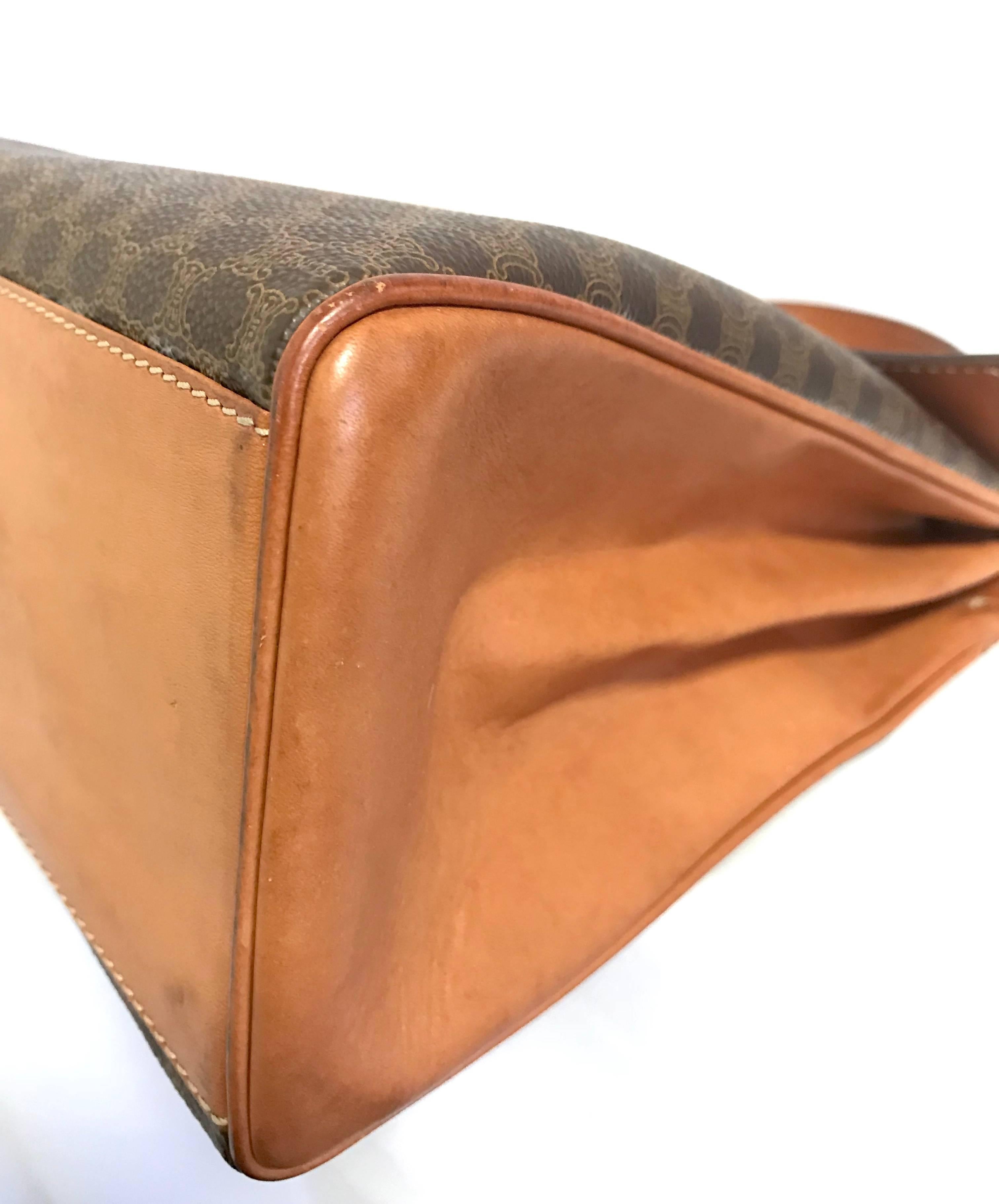 Vintage CELINE brown logo printed Kelly style handbag with golden closure. For Sale 4