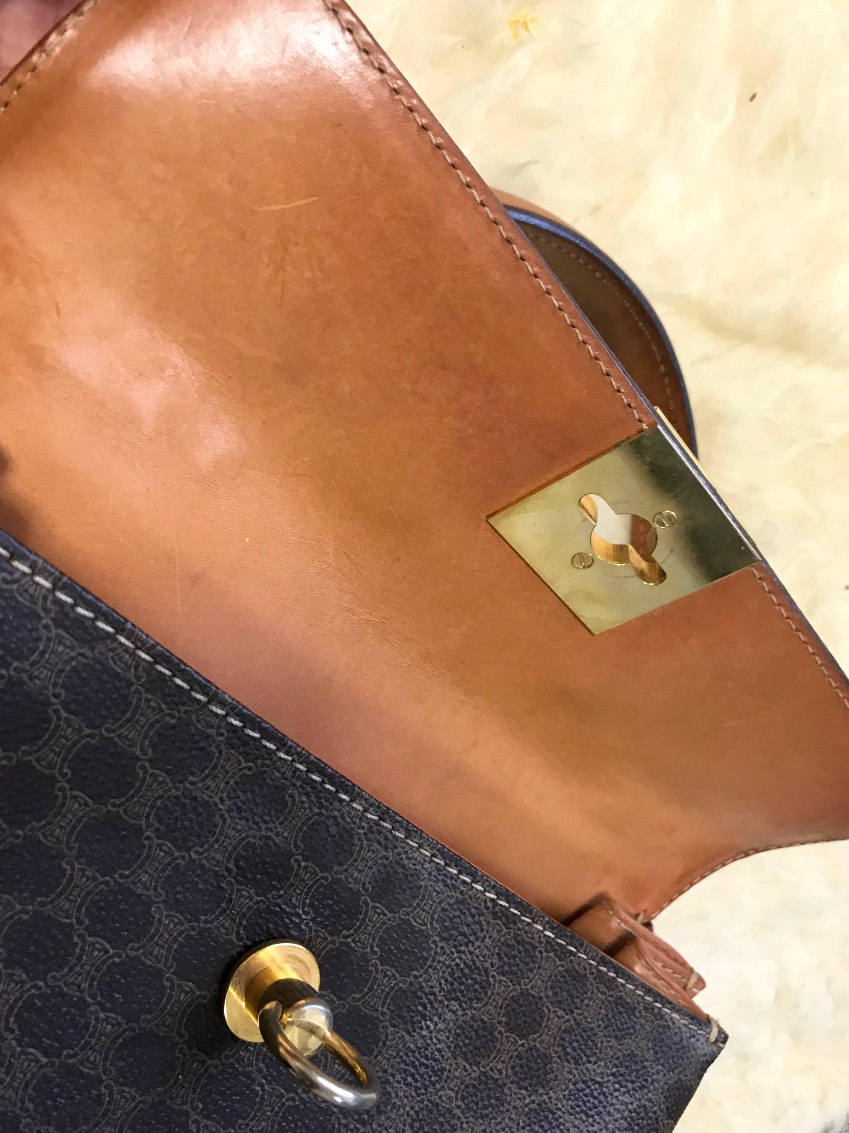 Vintage CELINE brown logo printed Kelly style handbag with golden closure. For Sale 5